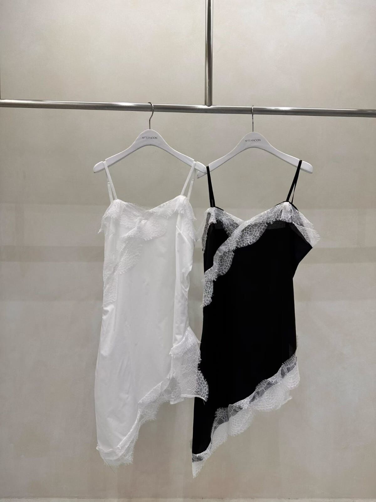 AF6036 蕾絲斜切下襬背心