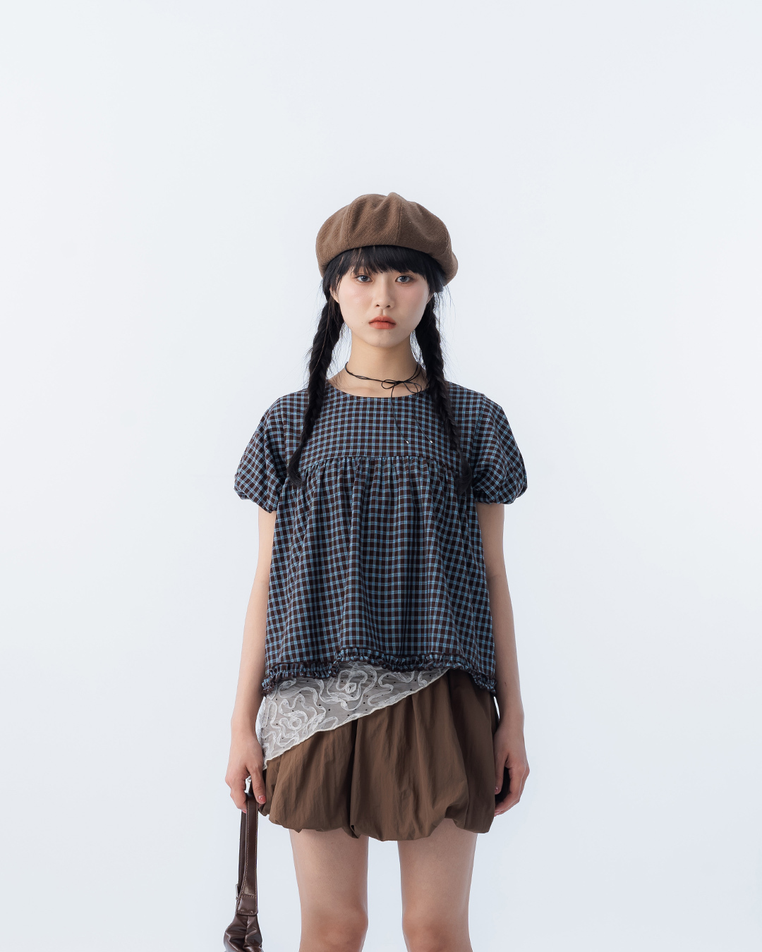Plaid ruffled top with puff sleeves and an umbrella hem, available in two colors.【01099657】in stock+pre-order