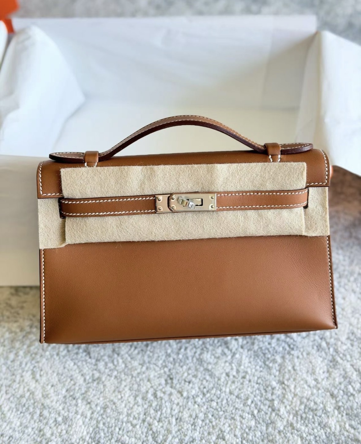 Kelly pochette 37 gold ck swift K