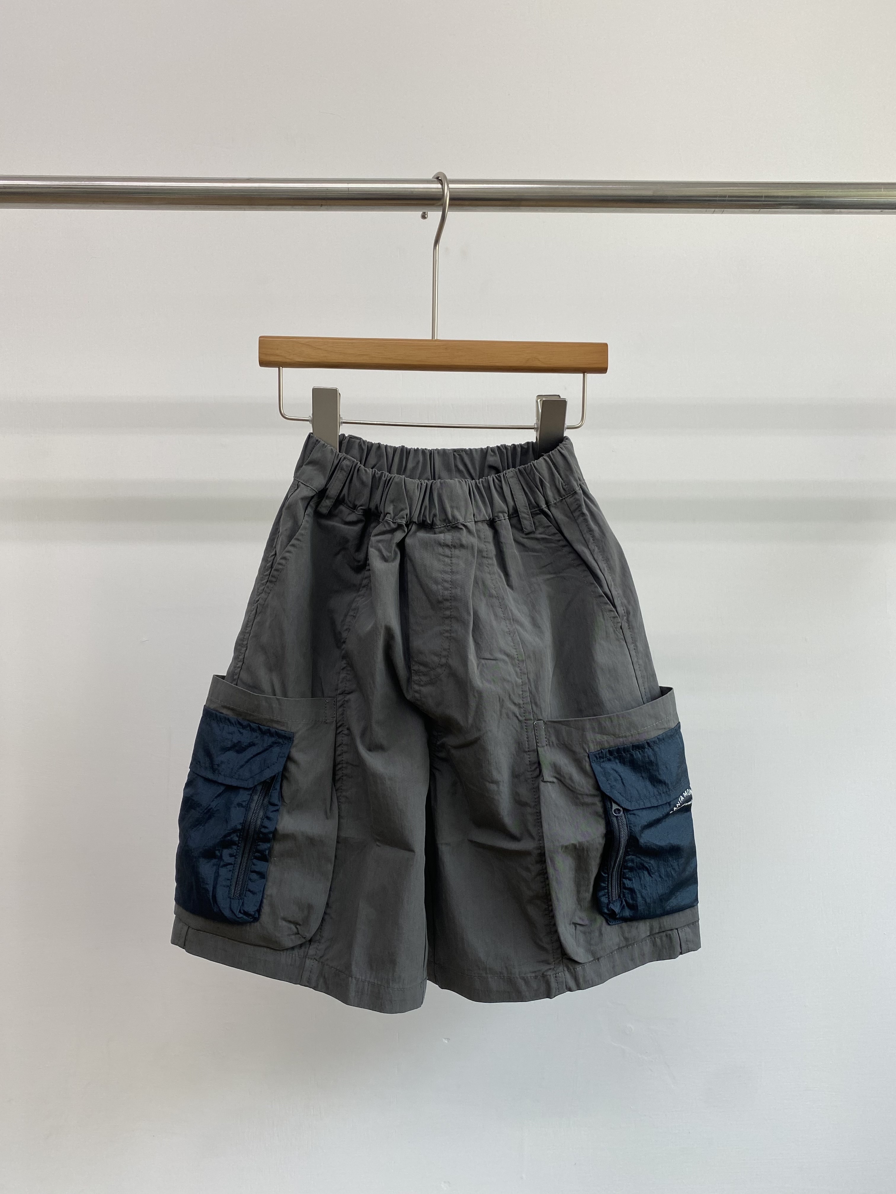 A04612設計師品牌撞色口袋五分褲