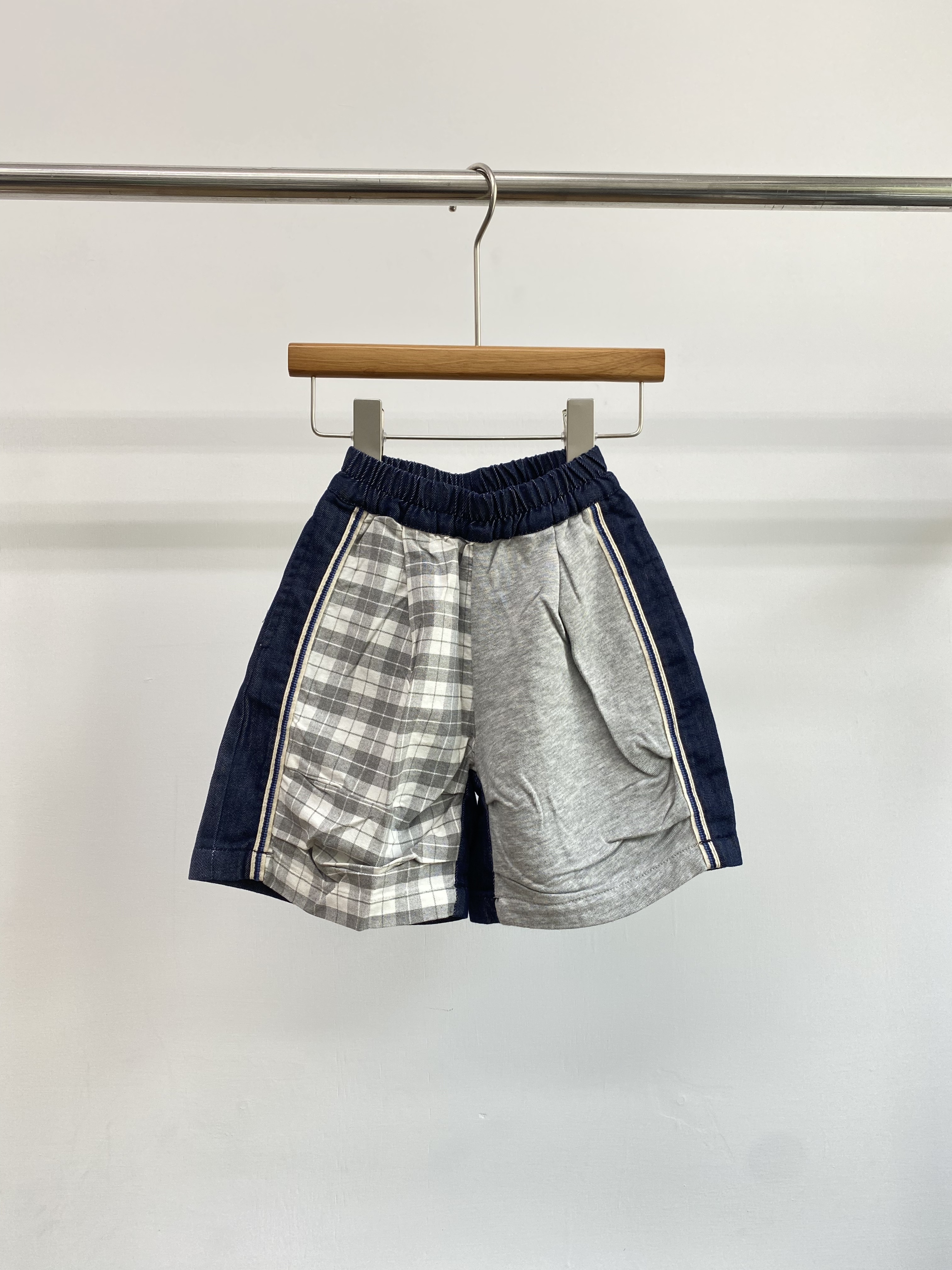 A04629設計款牛仔拼接格子褲