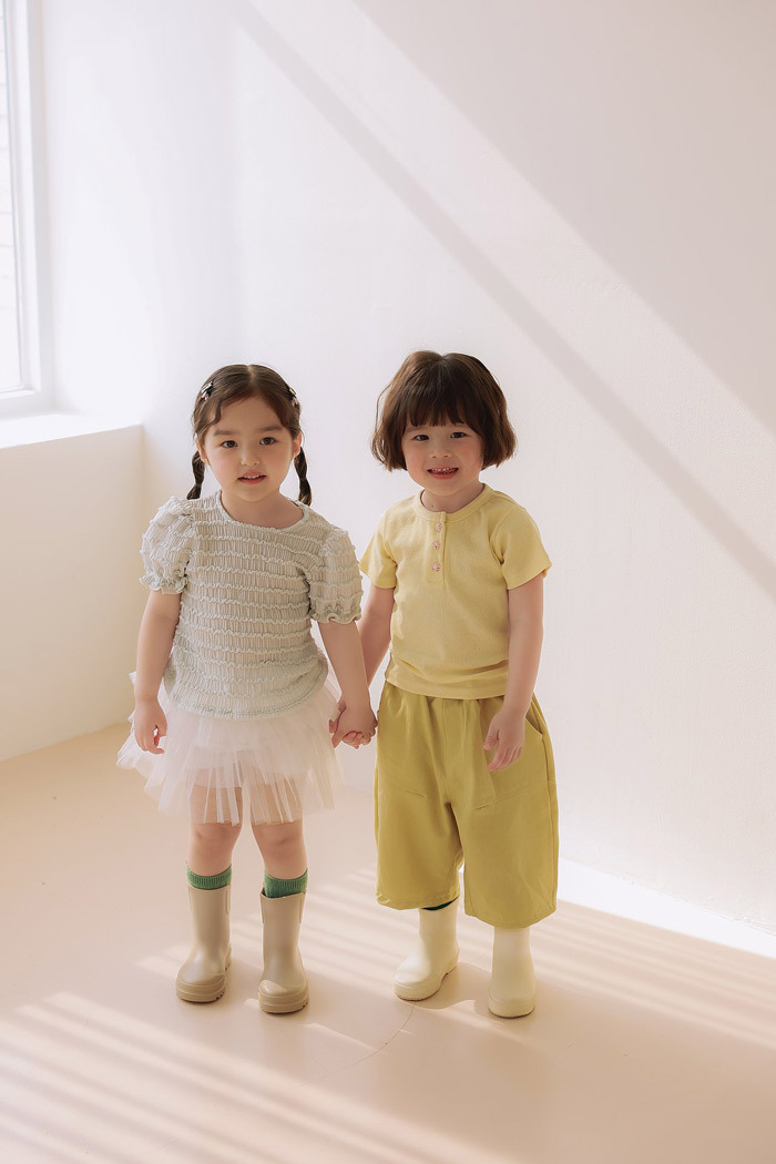 正韓夏JAZZ 波浪後鈕扣上衣