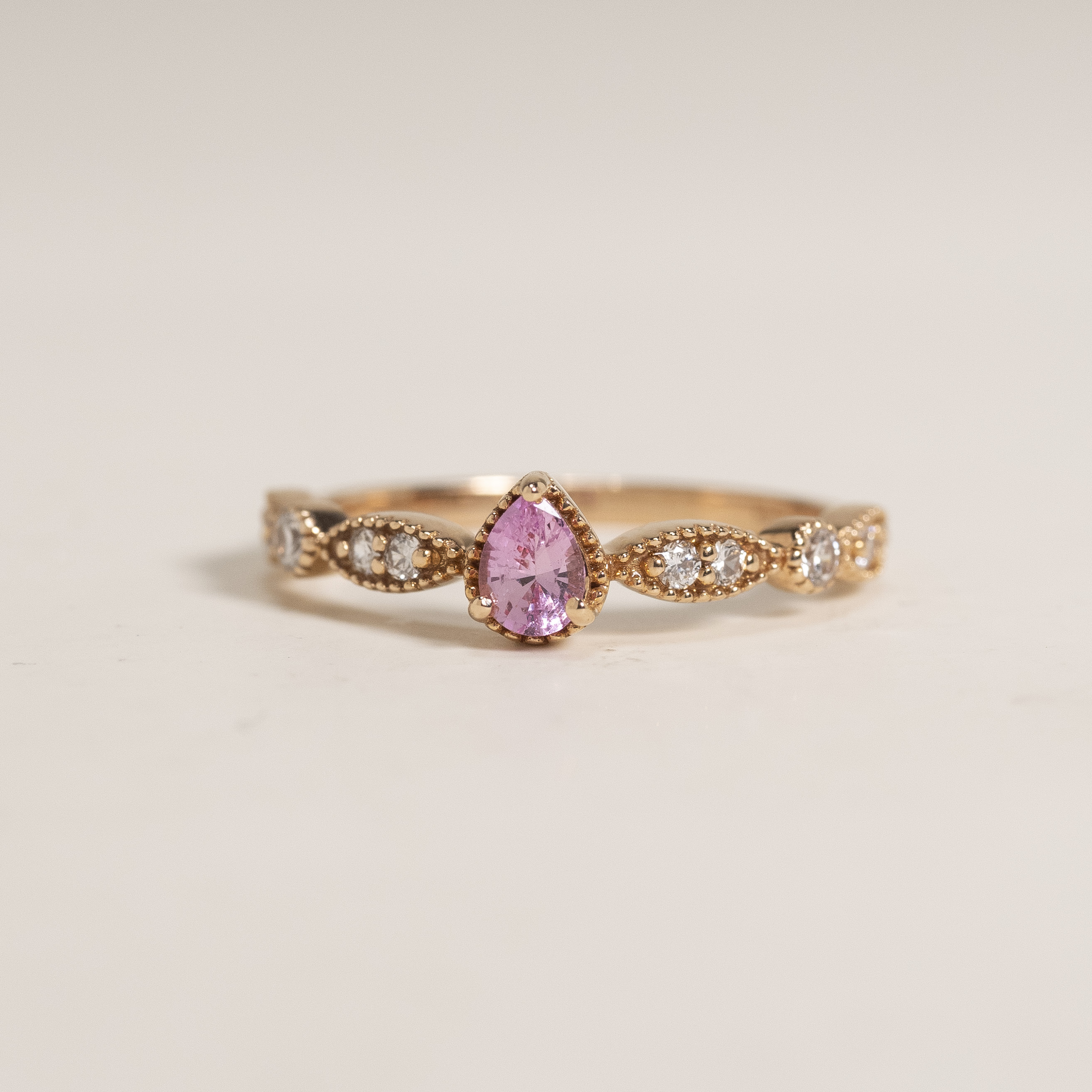 #(7.5) 18K Pear Shape Pink Sapphire Diamond Ring