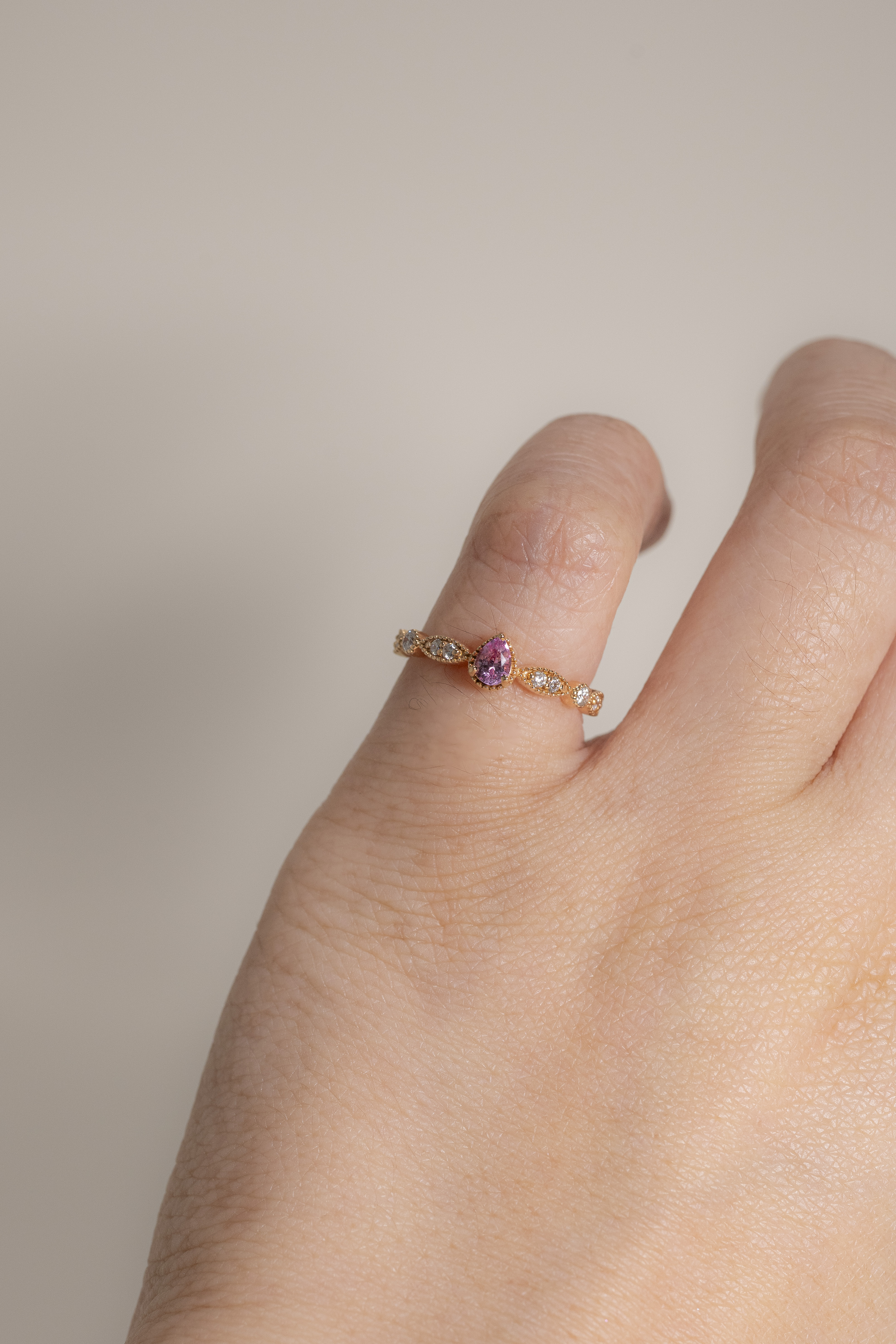 #(7.5) 18K Pear Shape Pink Sapphire Diamond Ring