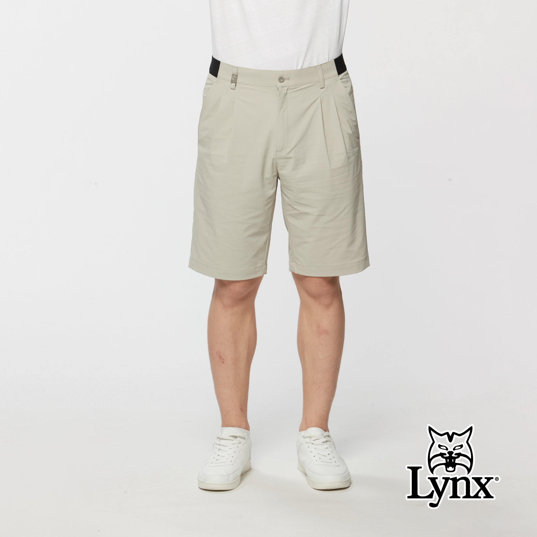 男款腰圍剪接打折造型素面休閒短褲