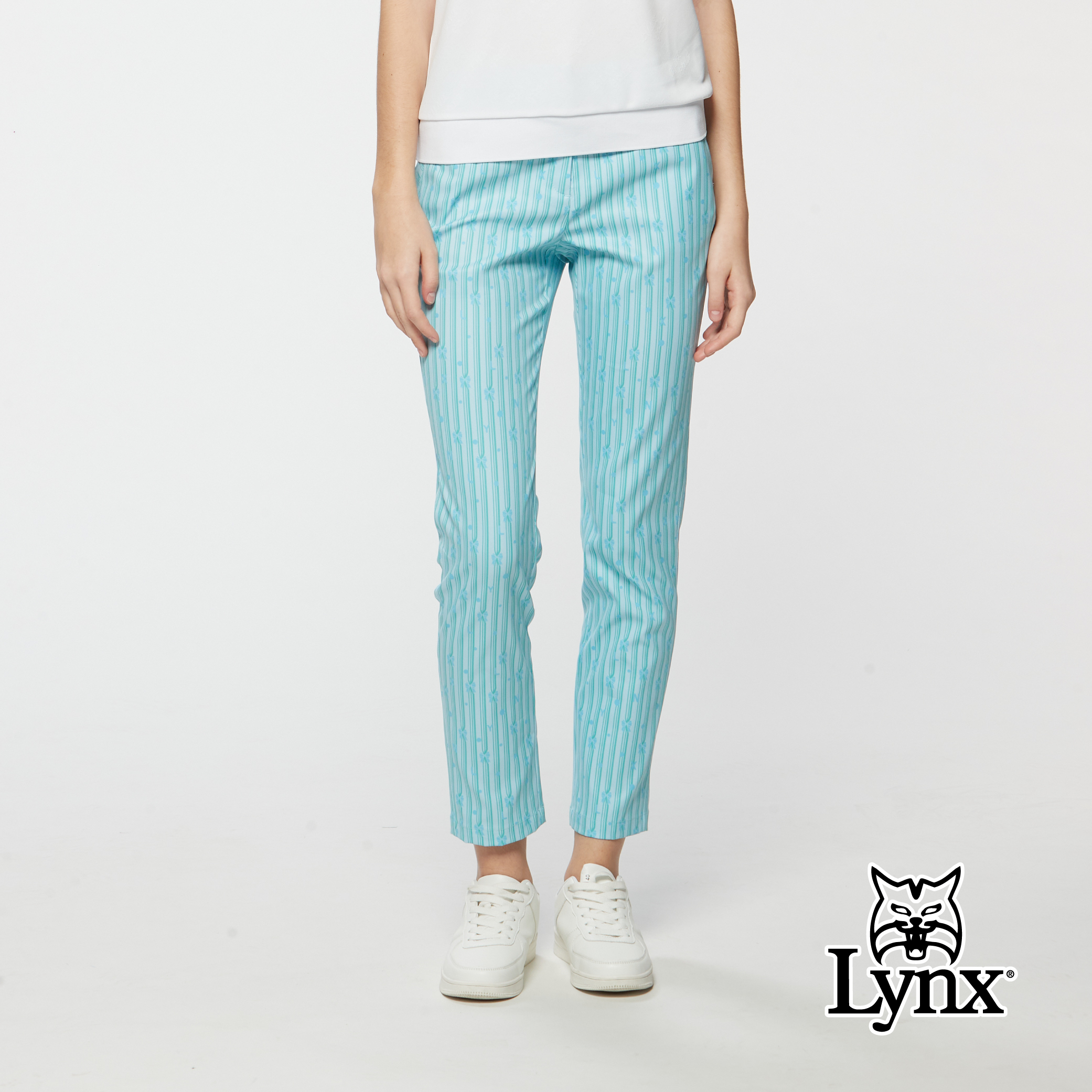 女款防潑水SORONA纖維經典條紋拉鍊後袋九分褲