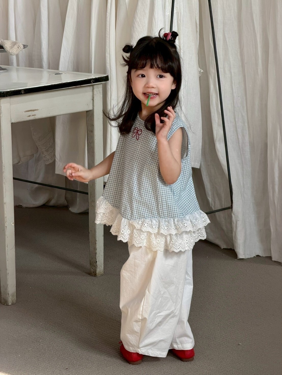 格紋裡藏蝴蝶結上衣