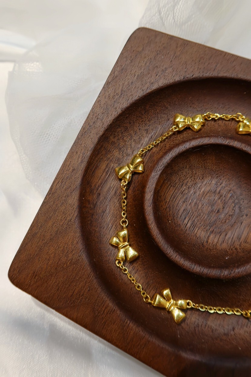 流光蝴蝶結手鍊 Golden Ribbon Charm Bracelet