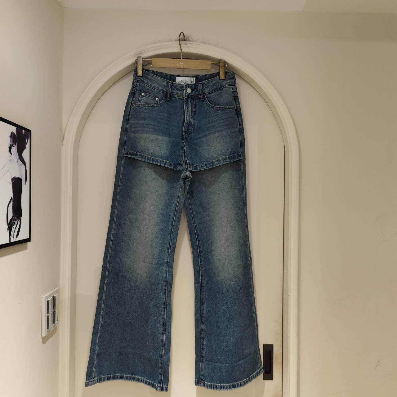 Nellie&Co. 設計感前裙片拼接喇叭牛仔褲