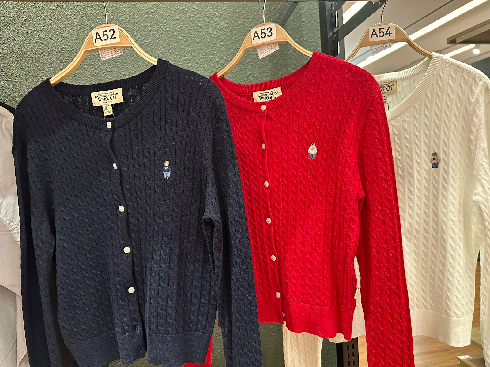 XI052 WHO A U 淨色麻花開胸長袖外套