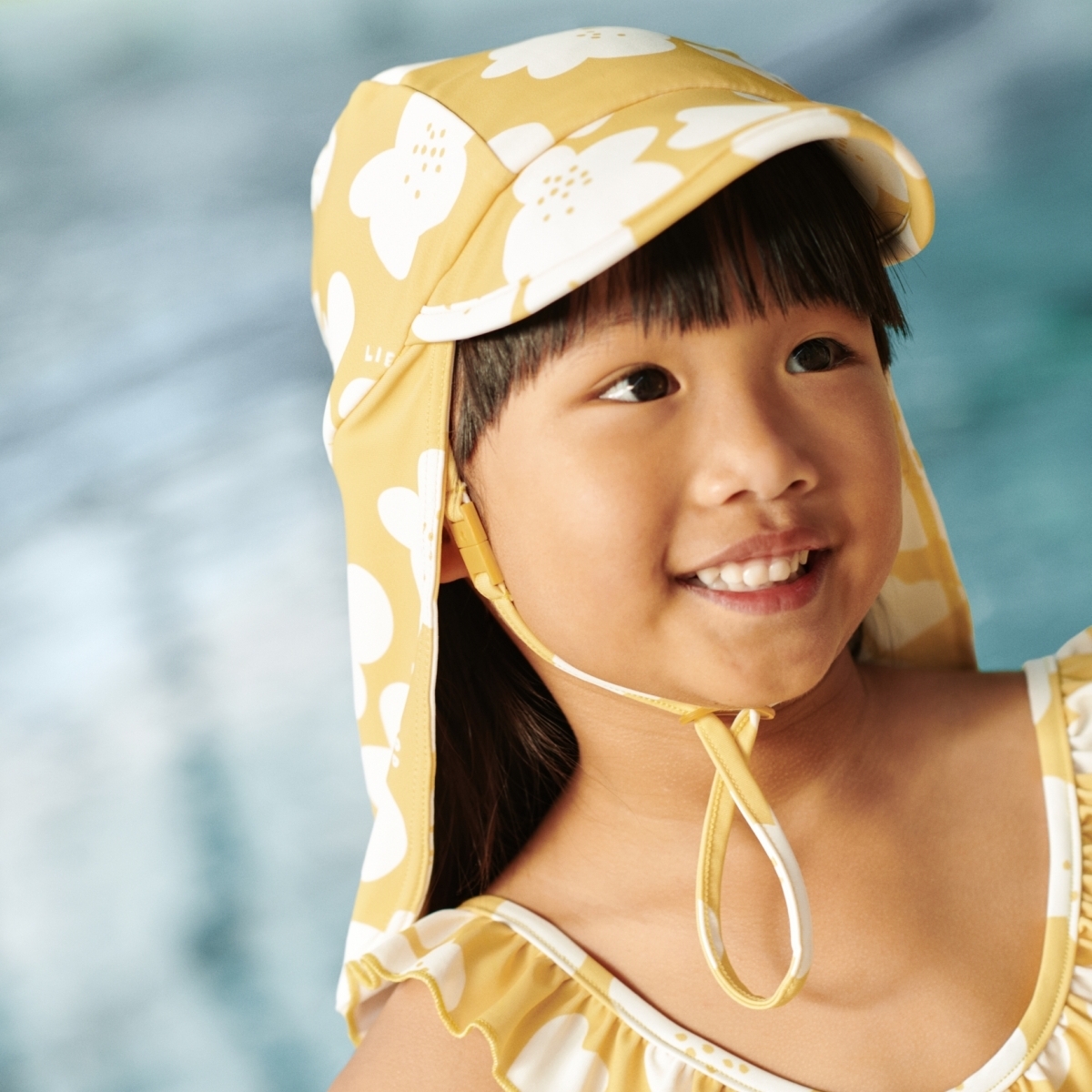 〖 Liewood 〗黃色花花愛心防曬泳帽