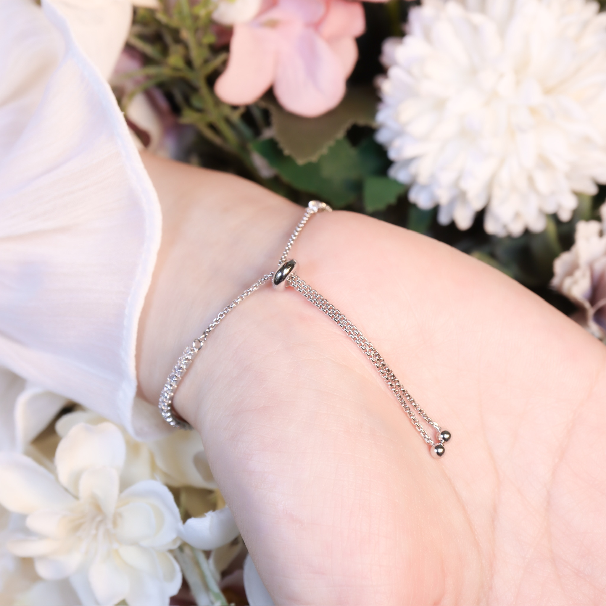 | 925純銀・ 厚鍍白金 ・莫桑石 | 鑽光幸福圓舞曲手鏈(藍色/白色) | BR1530 |