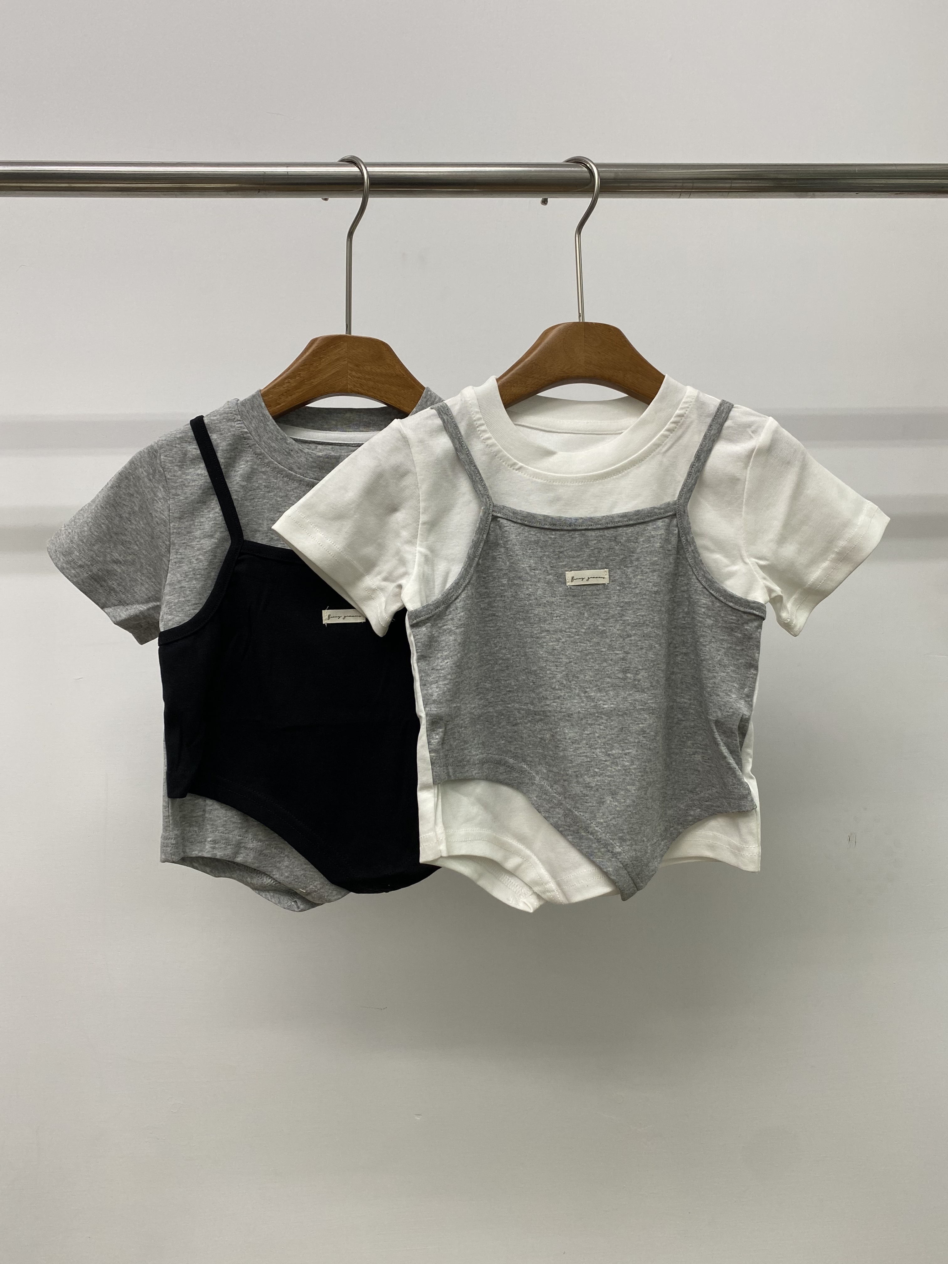 A04768設計款背心假兩件上衣