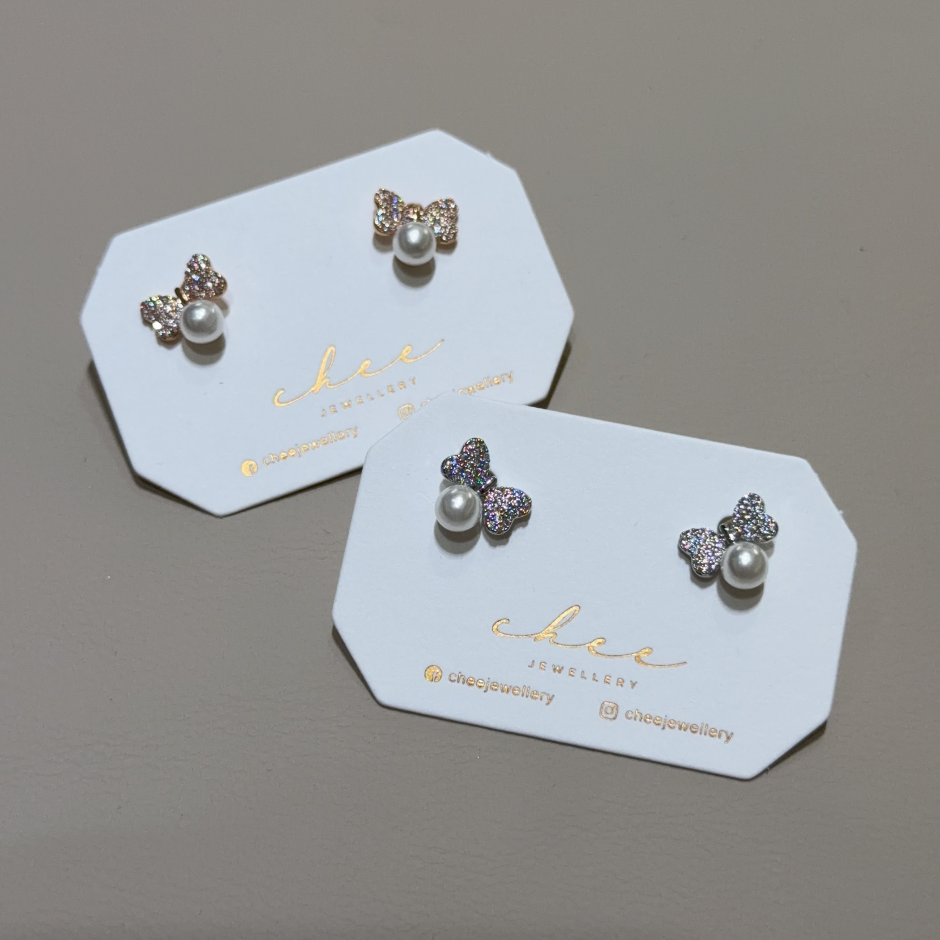 蝴蝶結拼小珍珠耳環 - R58