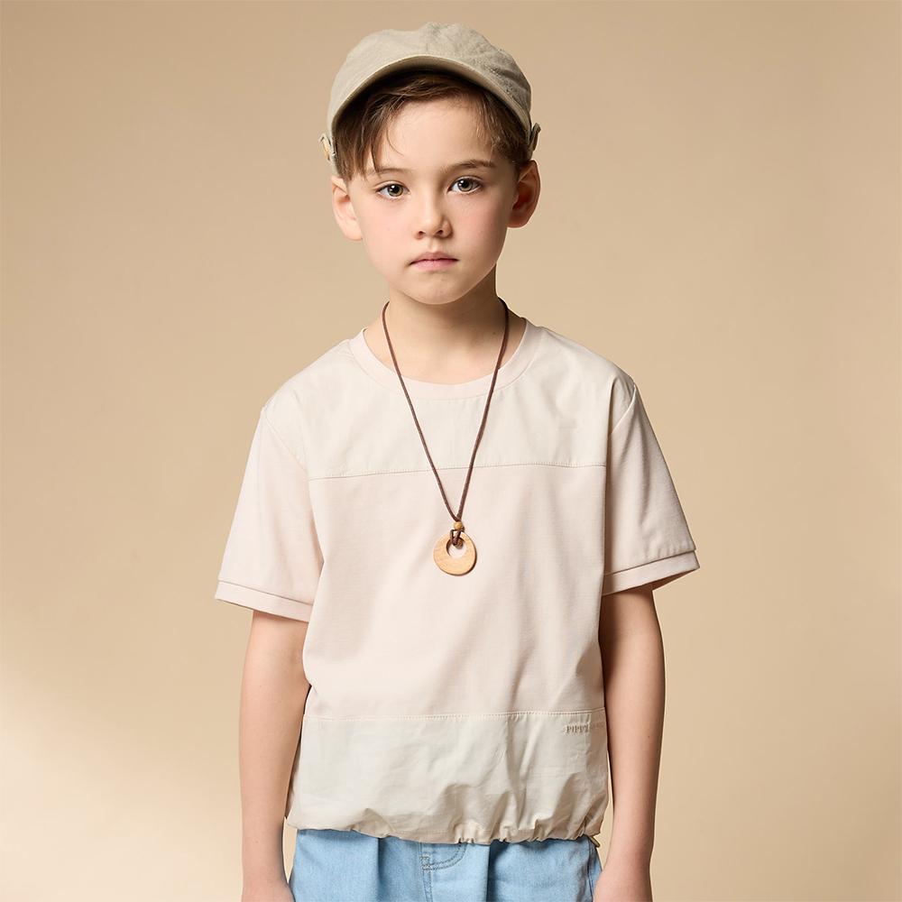 PIPPY  典雅剪接下擺抽繩圓領5分袖上衣 米白