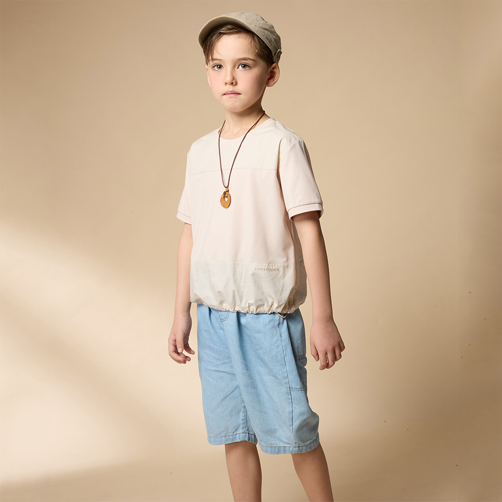 PIPPY  典雅剪接下擺抽繩圓領5分袖上衣 米白