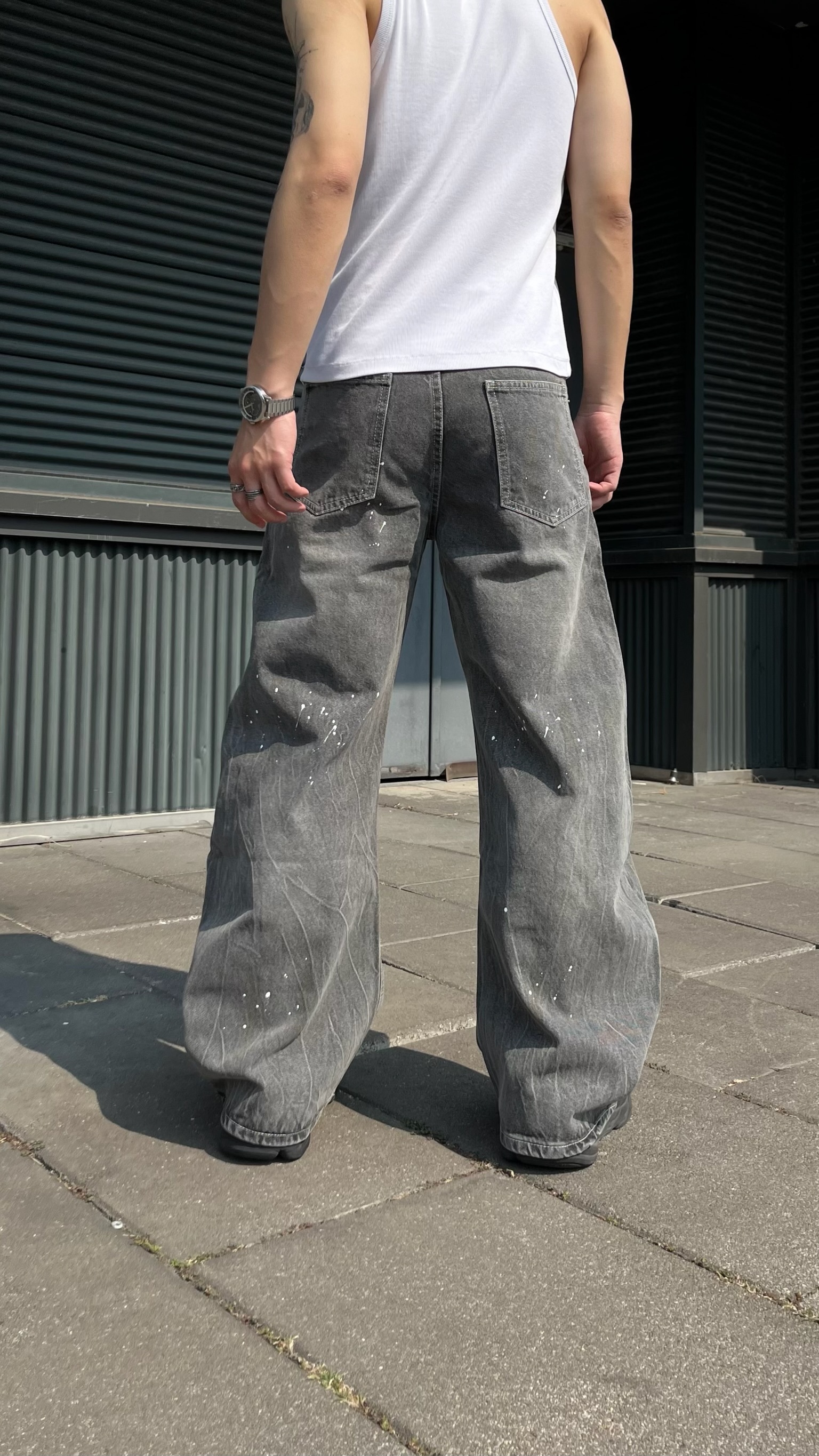 極簡潑漆彎刀牛仔褲