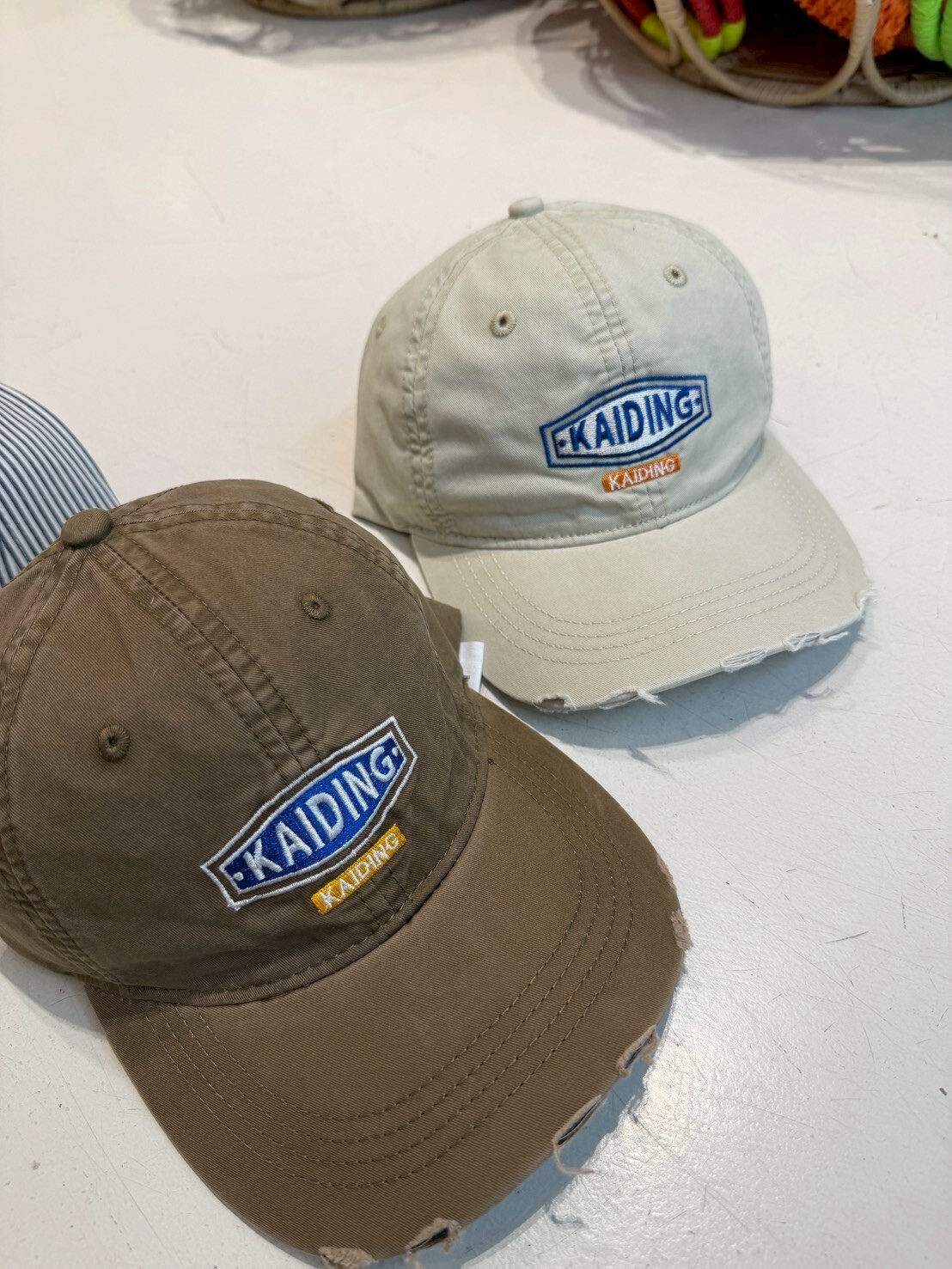 ka038藍標章破損帽