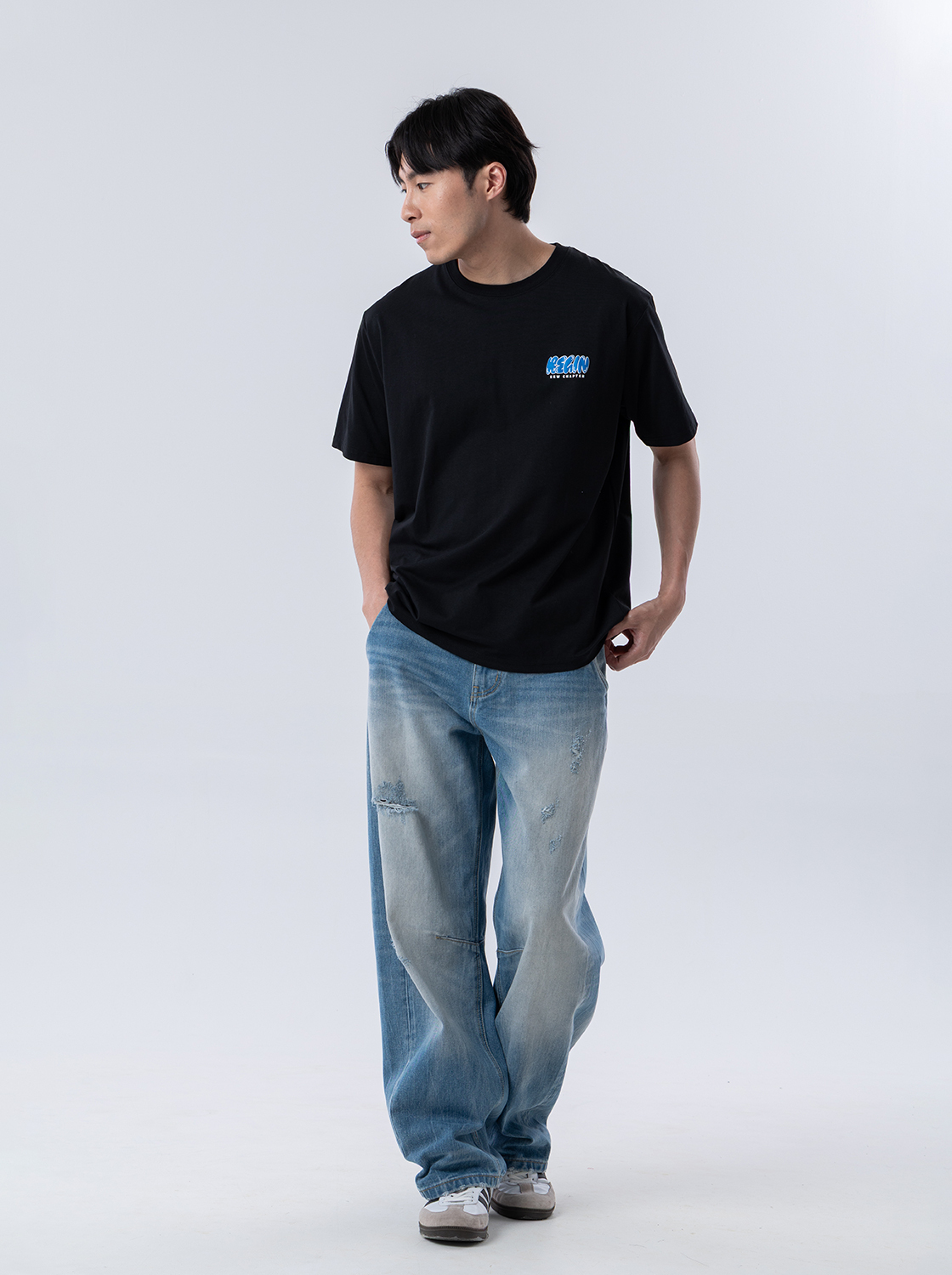 精緻水洗彎刀牛仔褲