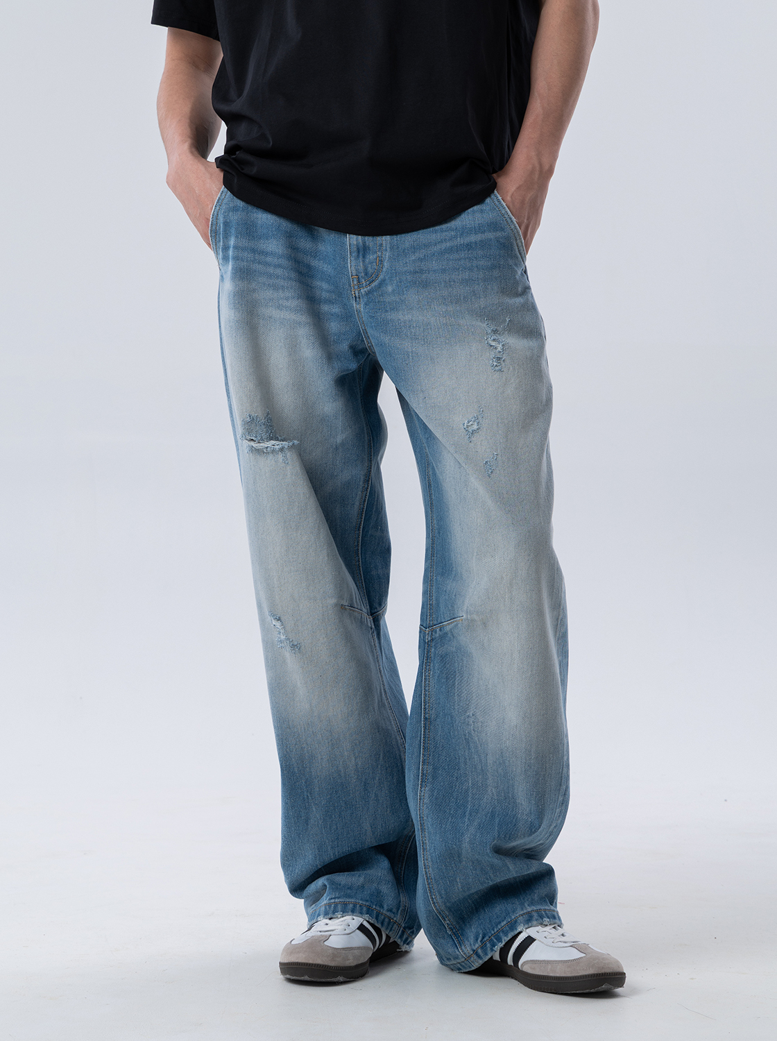 精緻水洗彎刀牛仔褲