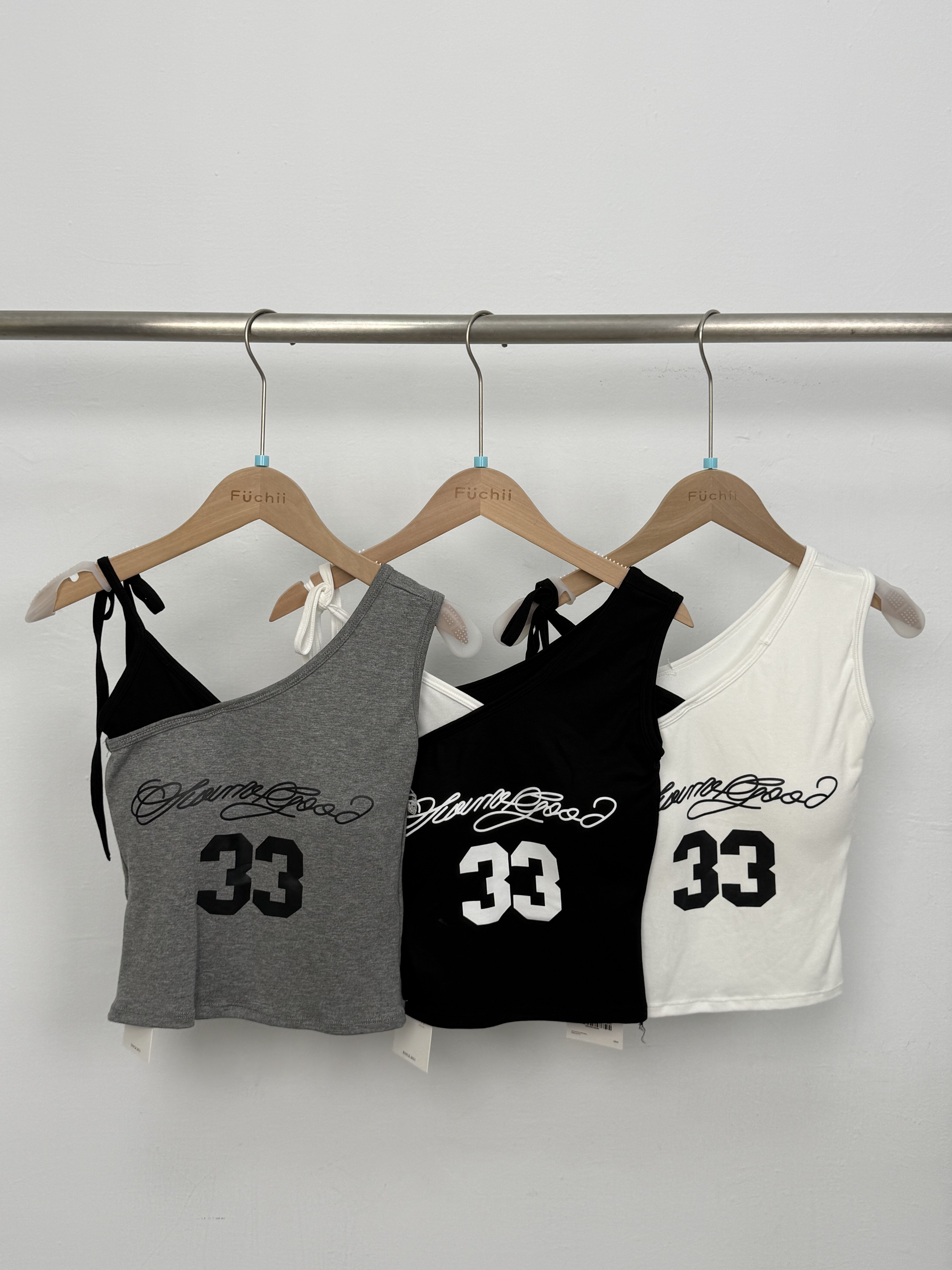 B07美式數字假兩件斜肩背心