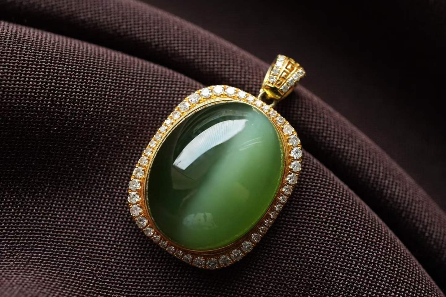 325442 和田玉冰底貓眼吊墜