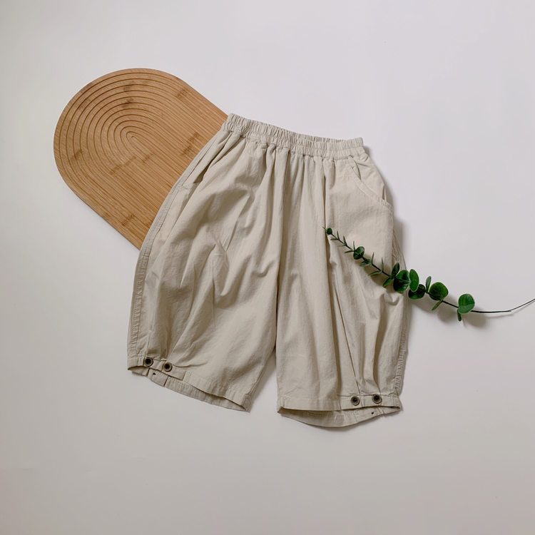 素面打折休閒七分褲