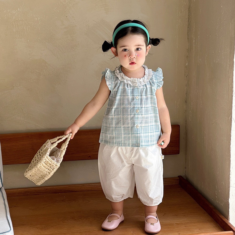 淺藍格飛袖上衣