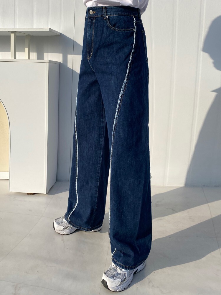 (韓國獨家特價)高級曲線毛邊剪裁牛仔褲