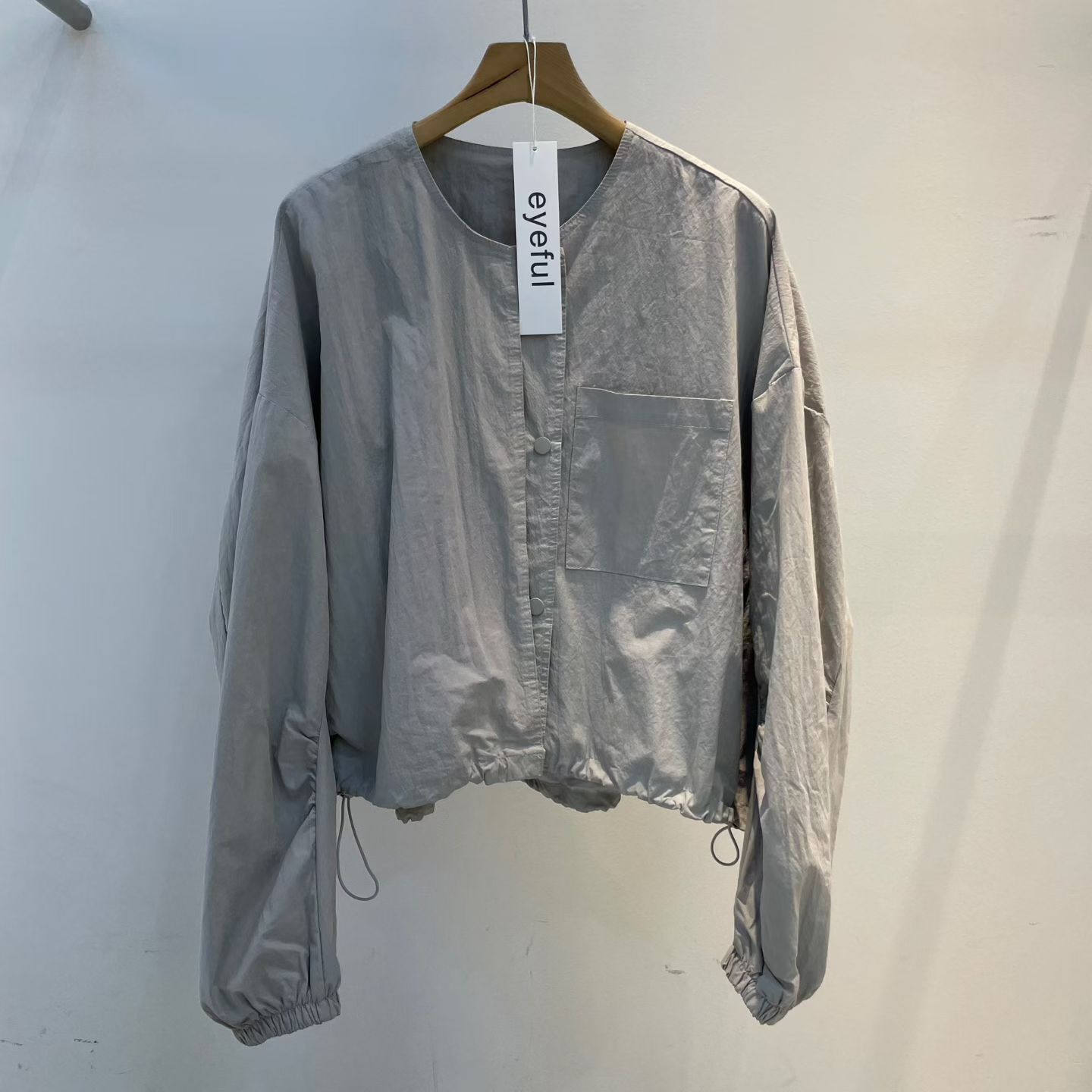 EY6018 運動風單口袋束腰啪鈕外套