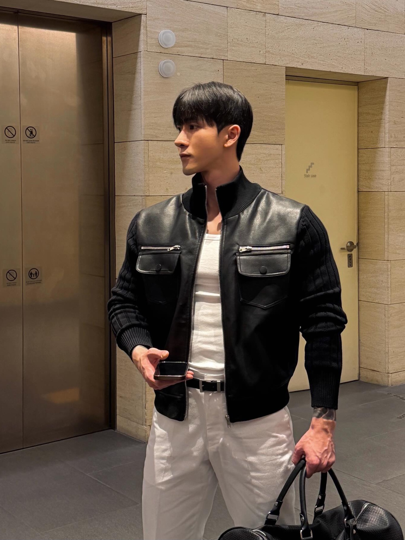 高領針織拼接皮夾克