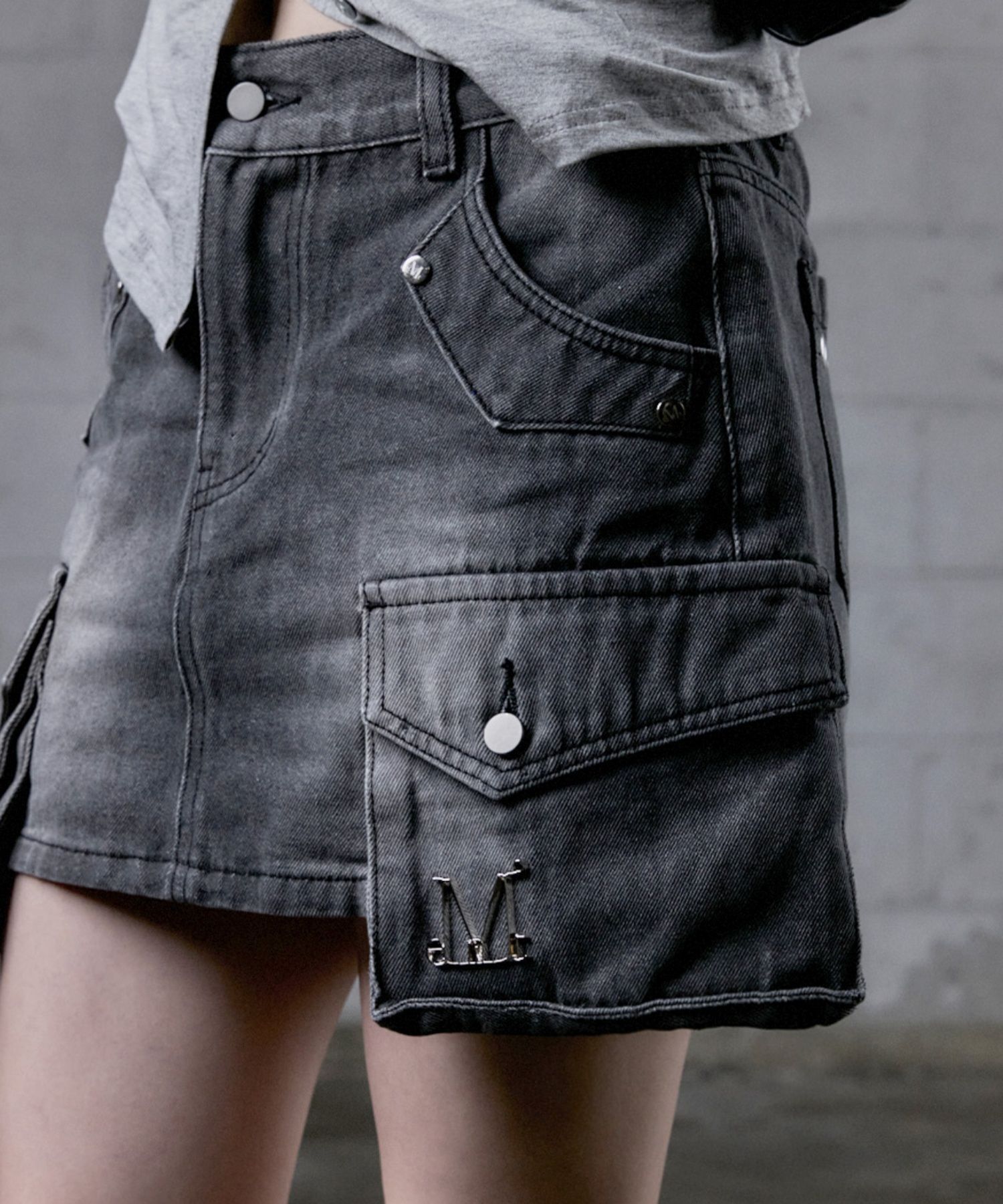 MUCENT 皮革口袋卡哥丹寧裙 P0000BND