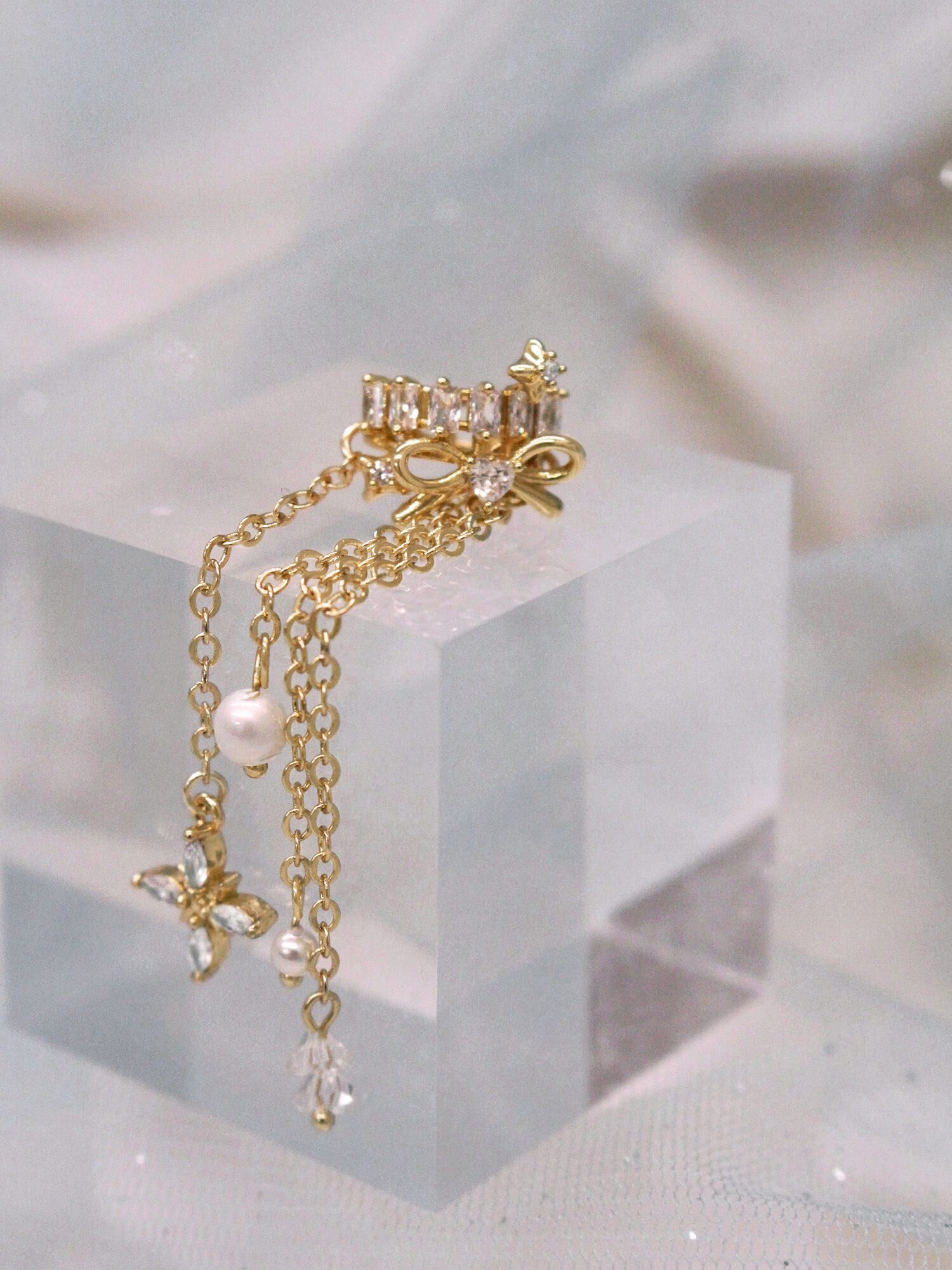 風箏記號。MUCHAT手作14KGP蝶結鋯石流蘇耳骨夾 (單支)