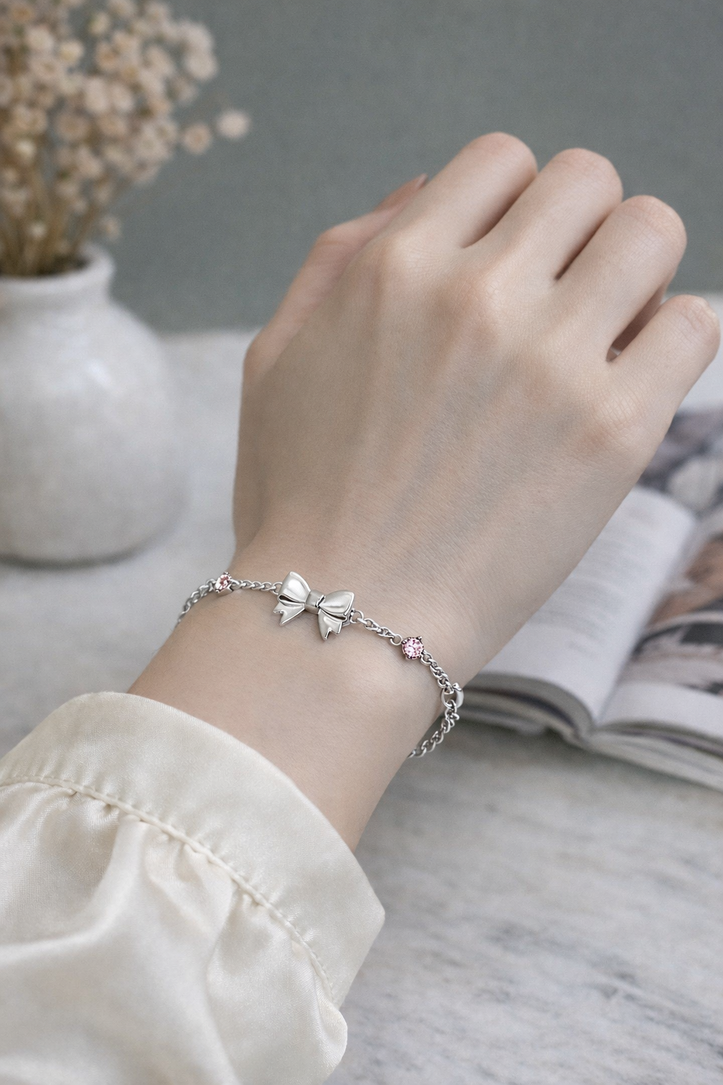 代購-CHARLES&KEITH 小ck 蝴蝶結系列 鑲鑽 可調節 黃銅水晶 手鍊 粉紅色Pink