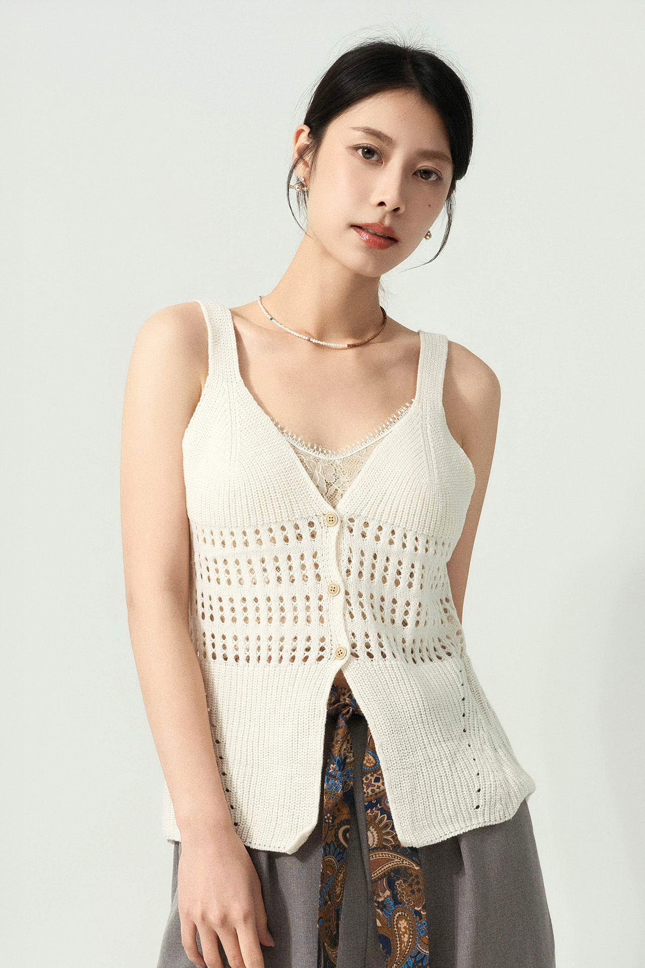 腰通花開胸針織背心（預購產品）