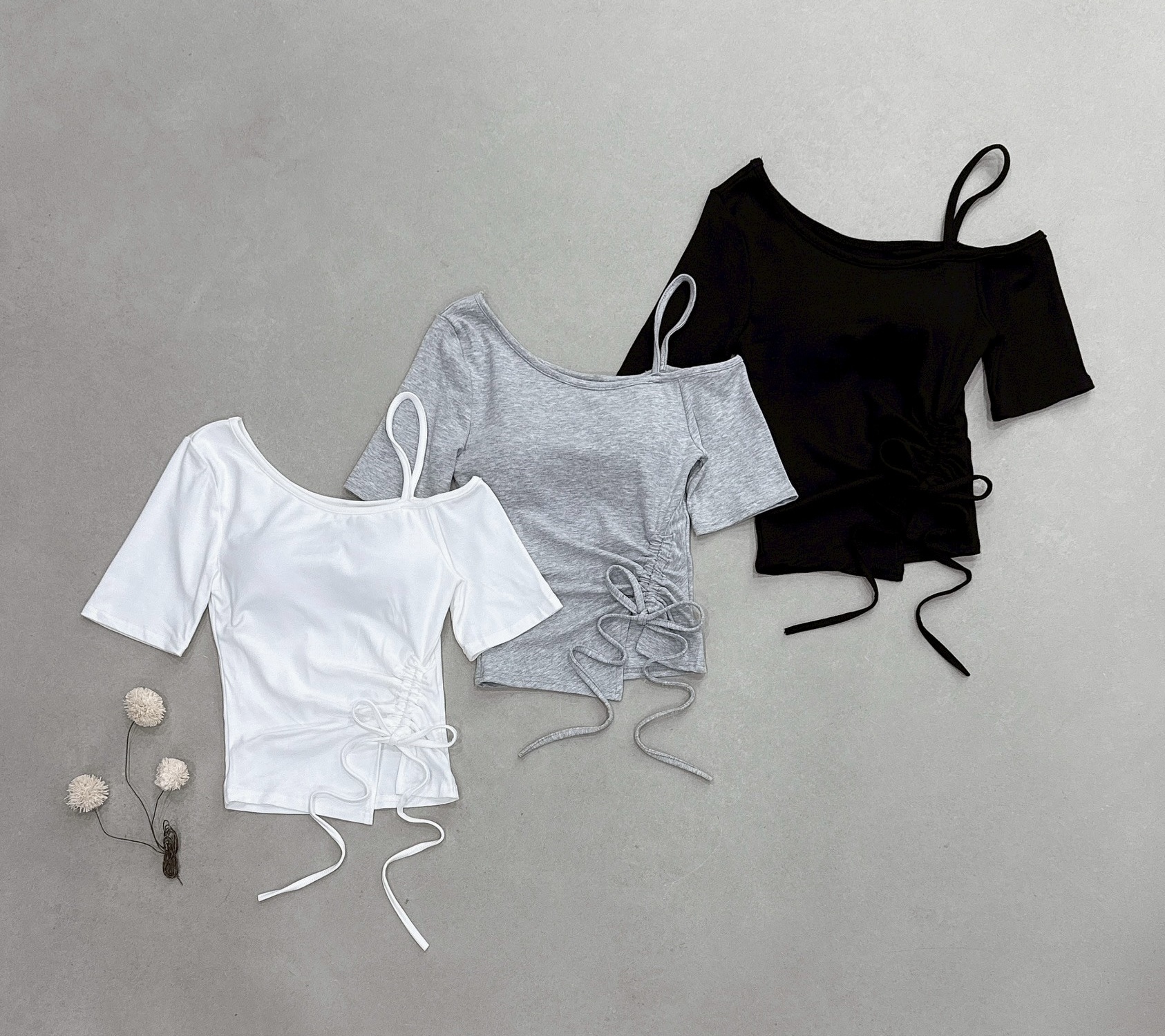 單挖肩吊帶斜抽繩罩杯衣