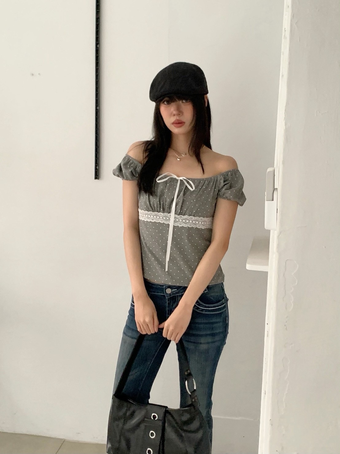 B175可愛蝴蝶結波點花苞短袖