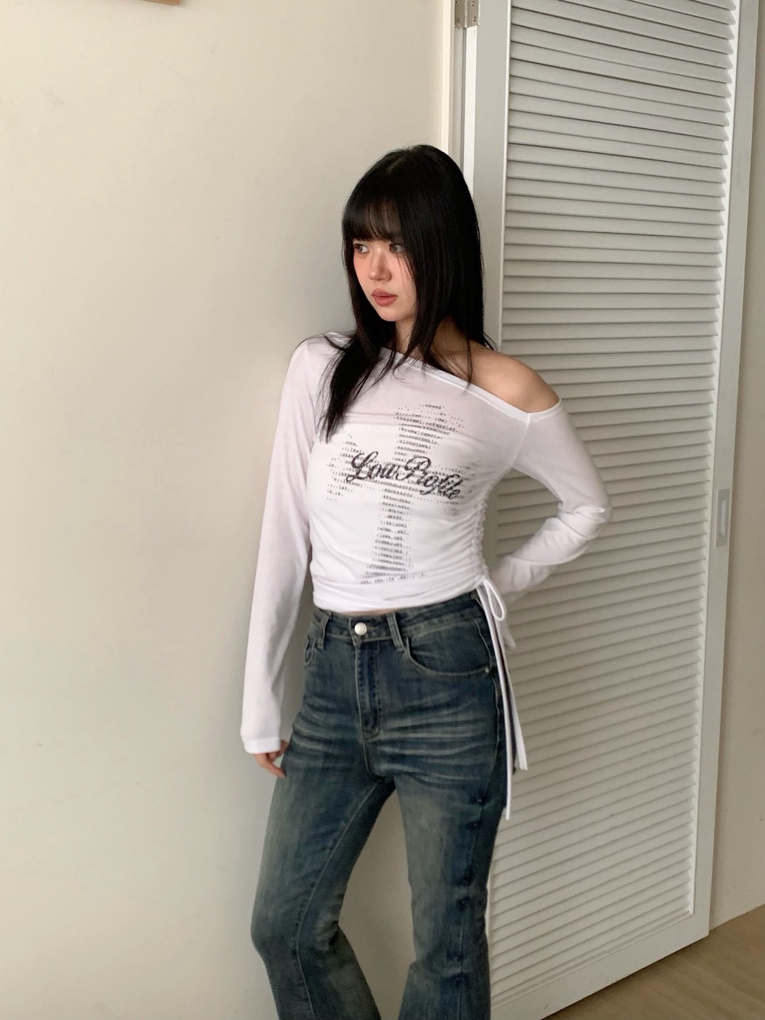 B152正韓英文印花斜下擺薄長袖