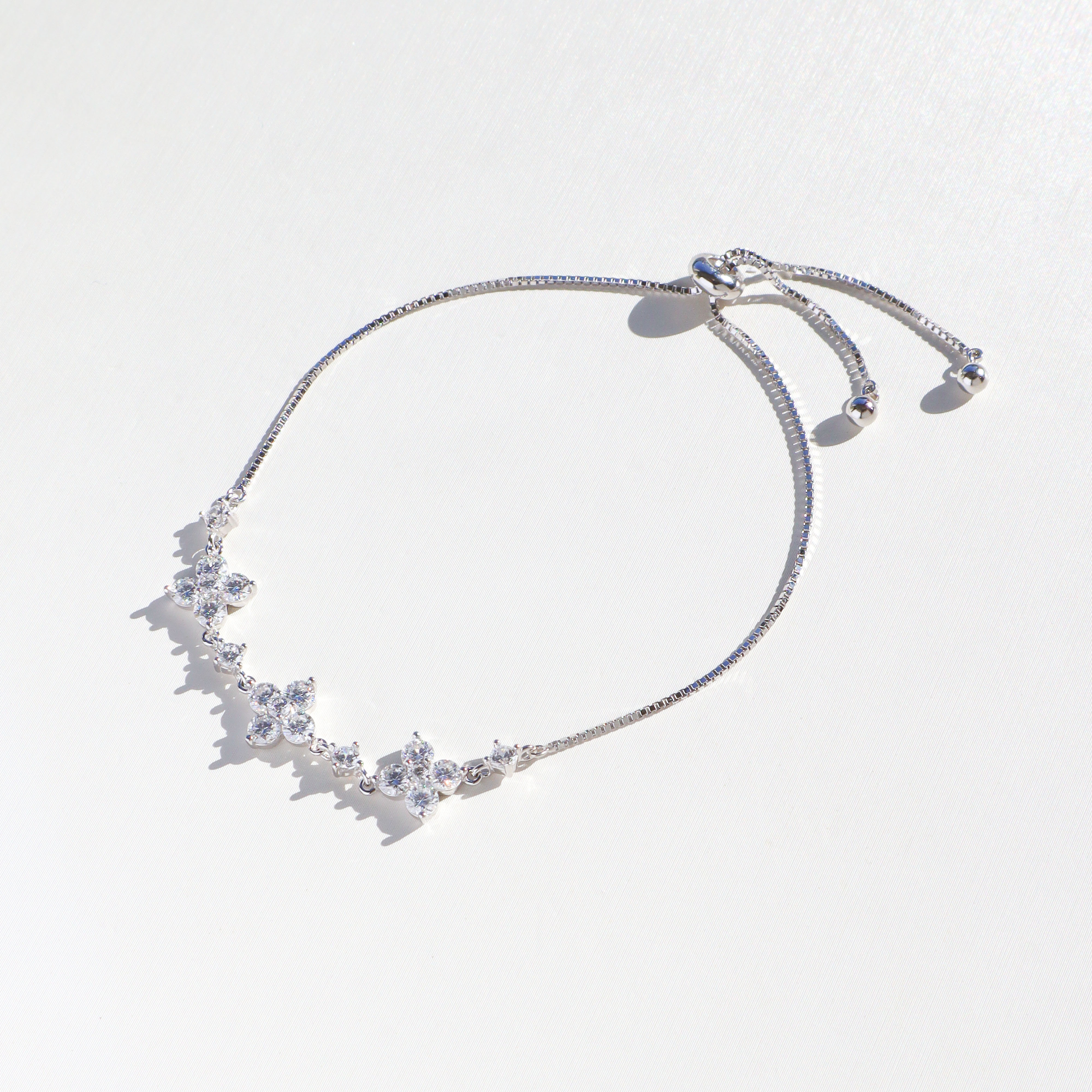 Silver/十字花莫桑石拉繩手鍊