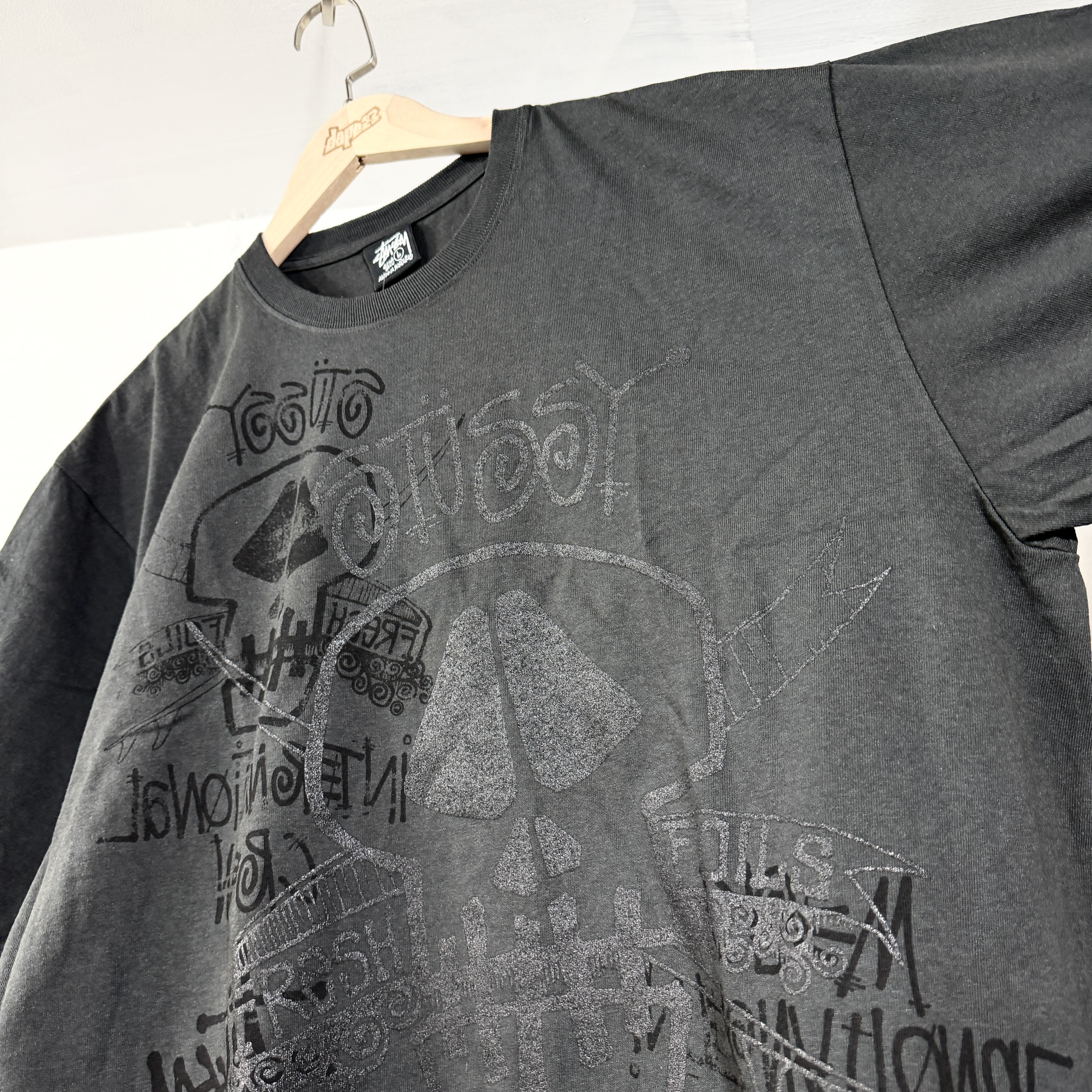 STUSSY SKULLS TEE PIGMENT DYED Faded Black 洗水黑