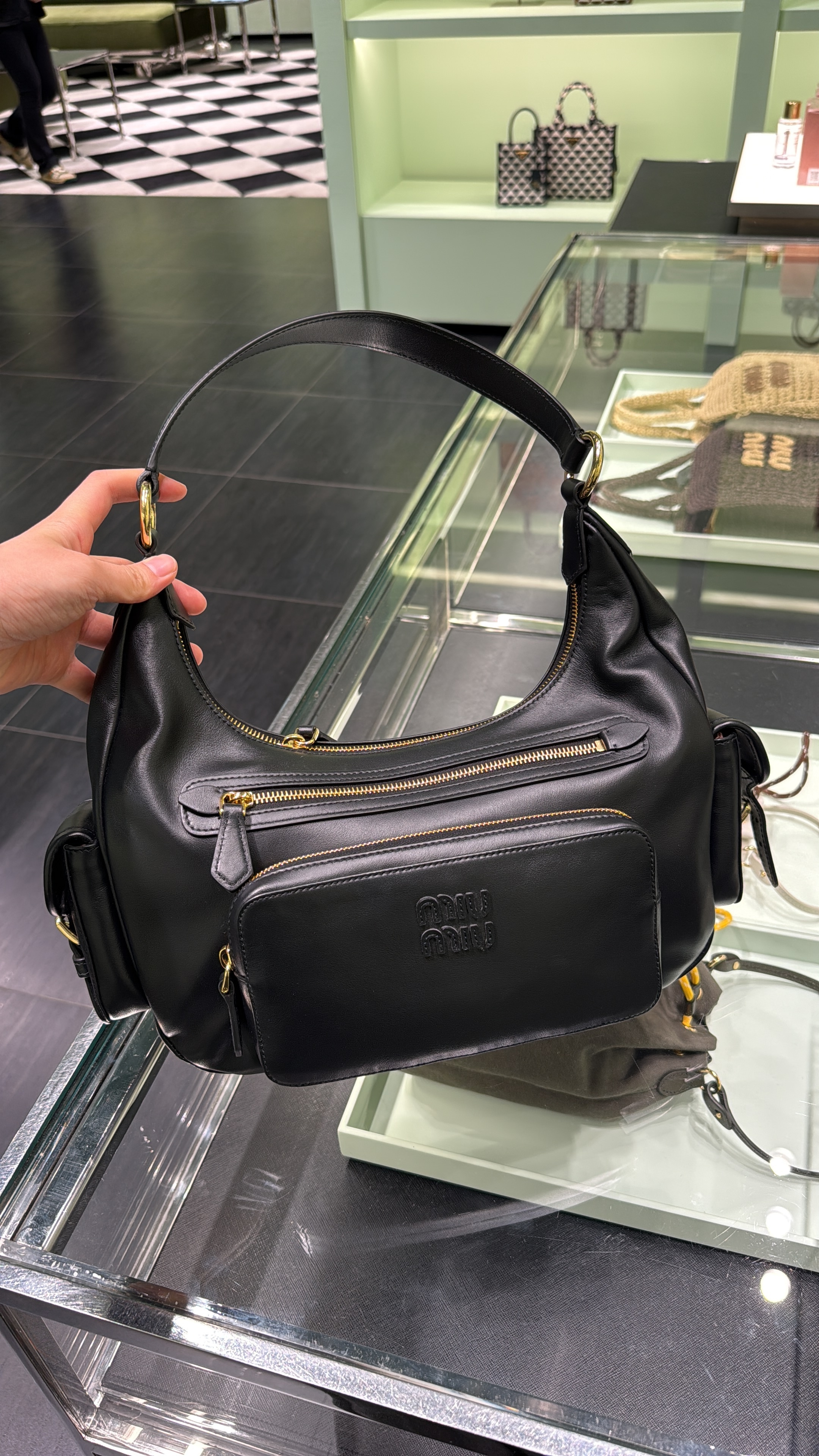 Miu Miu pocket leather hobo bag black