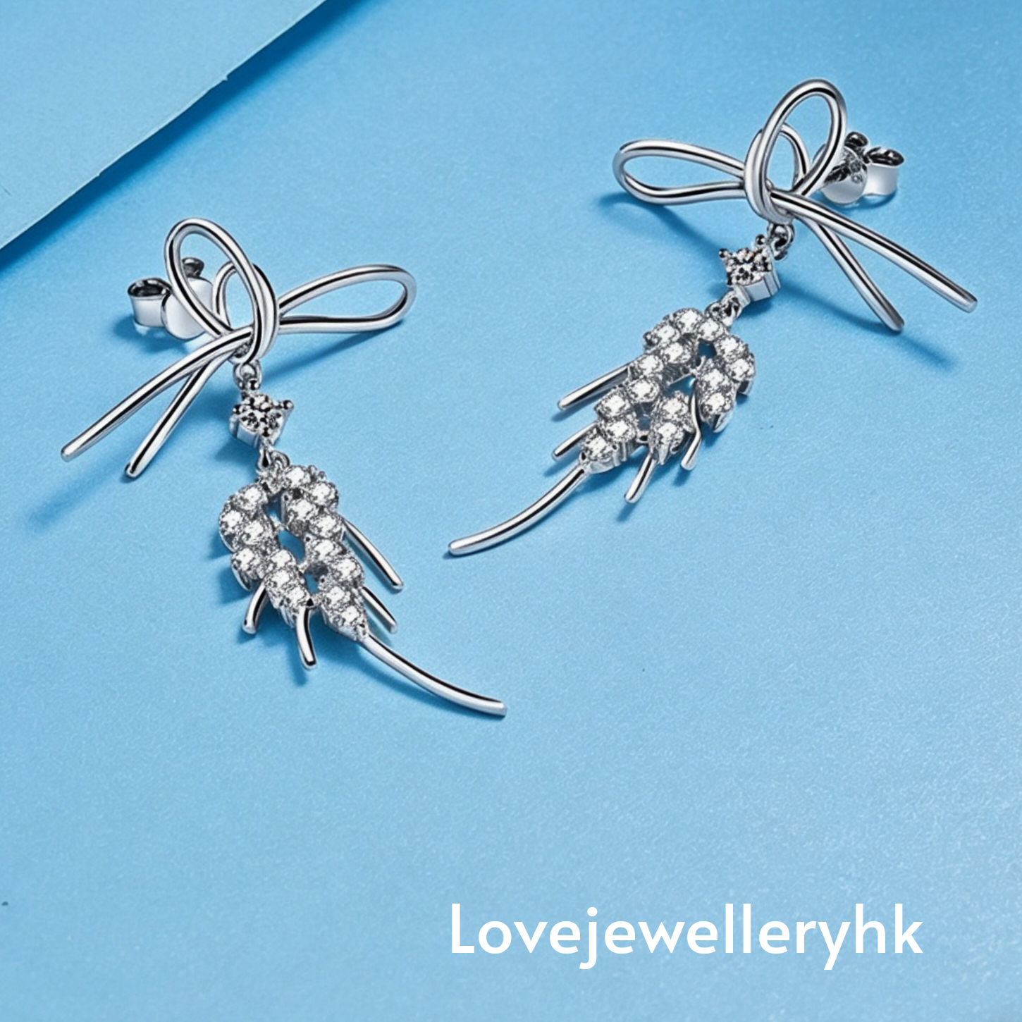 莫桑鑽蝴蝶結長款耳環       E1.04C021