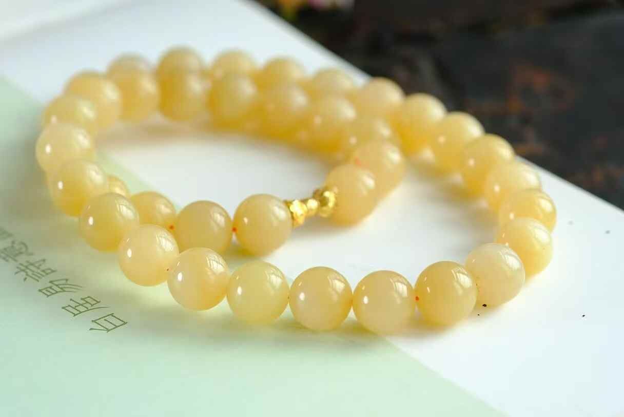 326755 和田玉黃口糖珠串 (12mm直徑)