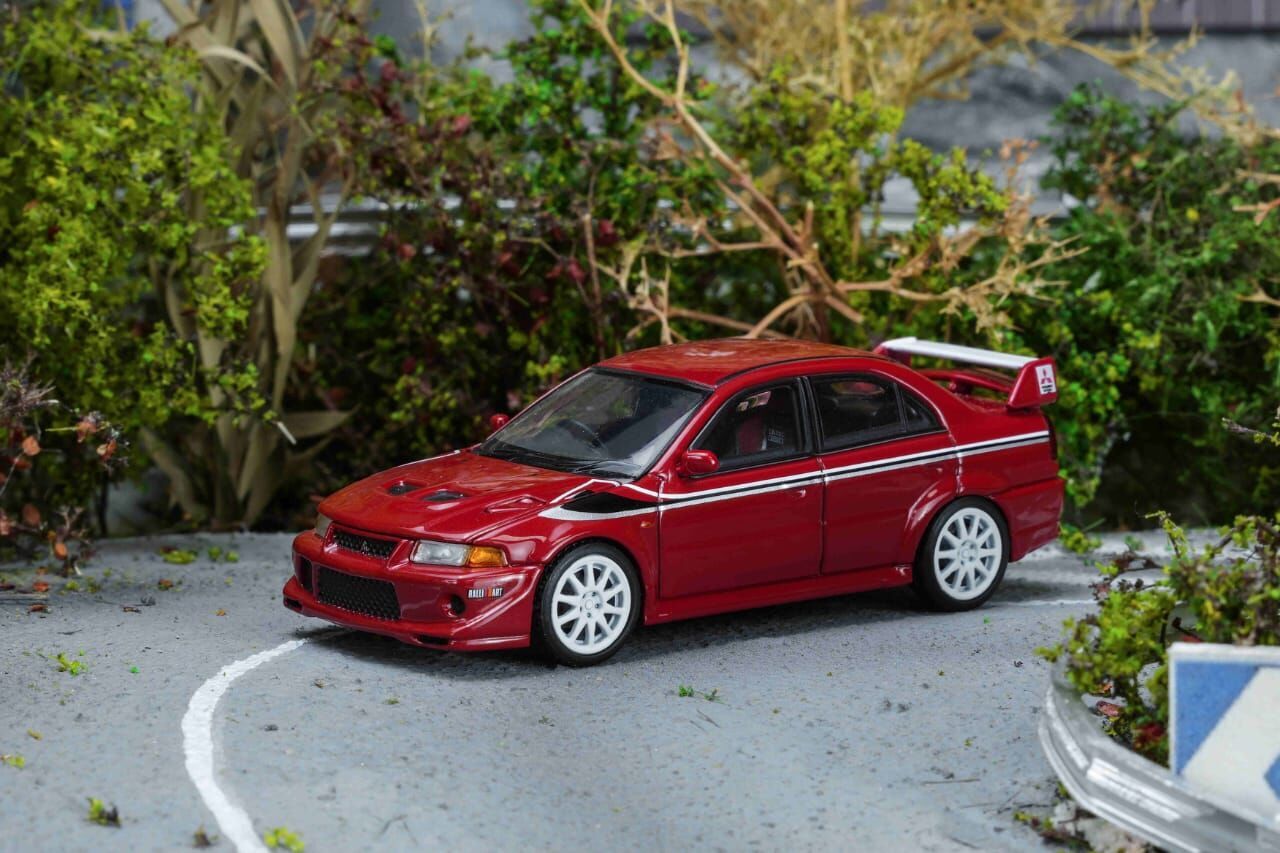 PO-$140 * MOTORHELIX * 1:64 MITSUBISHI LANCER EVOLUTION VI GSR T.M.E PASSION RED