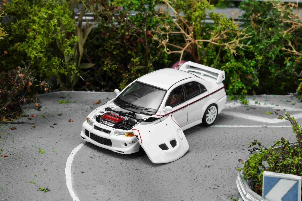 PO-$140 * MOTORHELIX * 1:64 MITSUBISHI LANCER EVOLUTION VI GSR T.M.E SCOTIA WHITE
