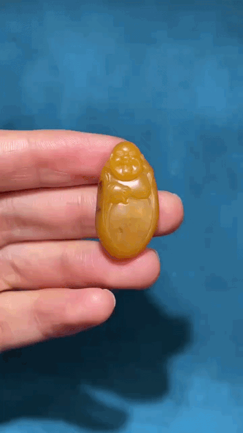 328343 和田玉籽料笑佛