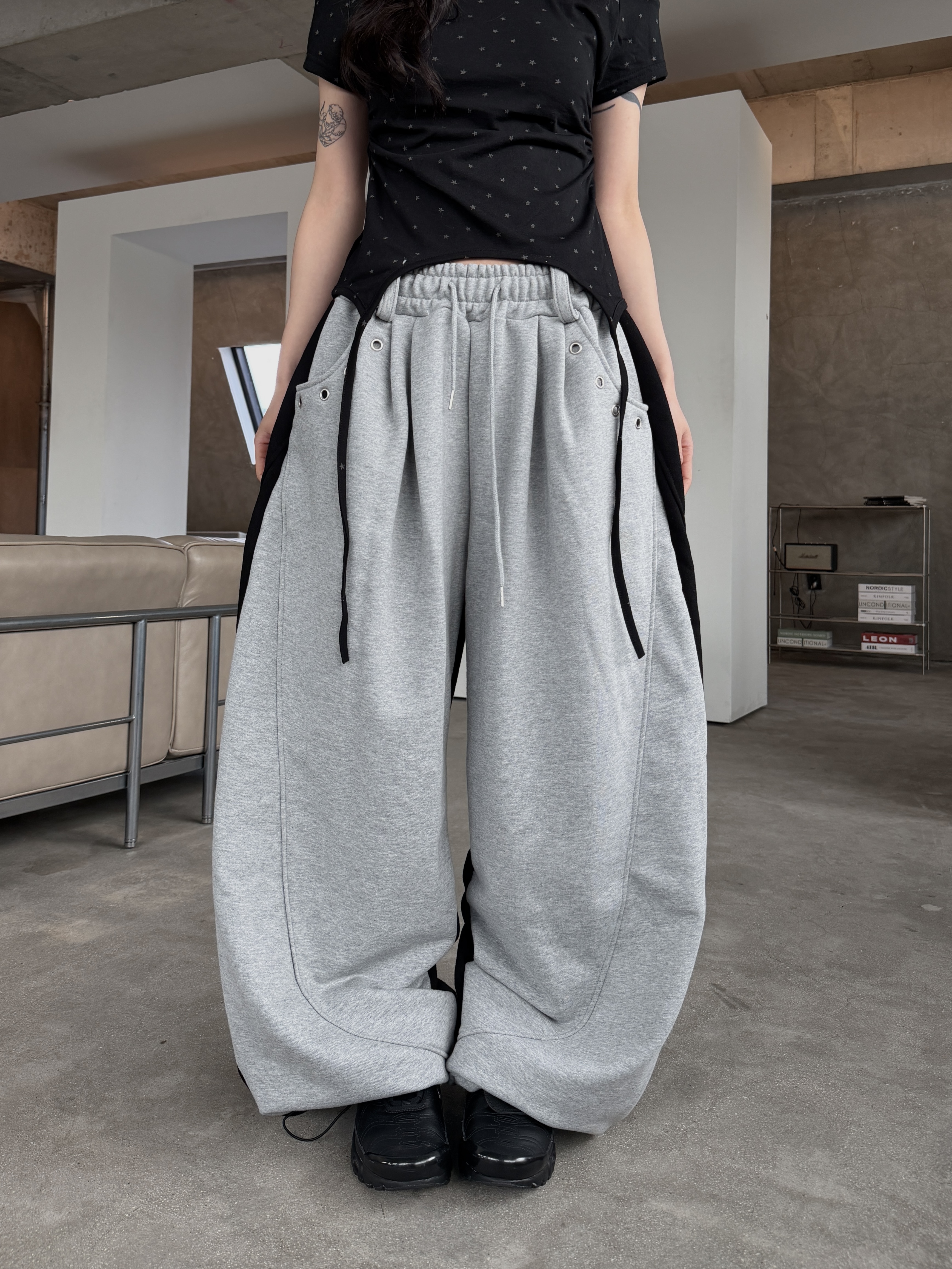 弧線拼接 鏤空卯釘 寬鬆落地棉褲