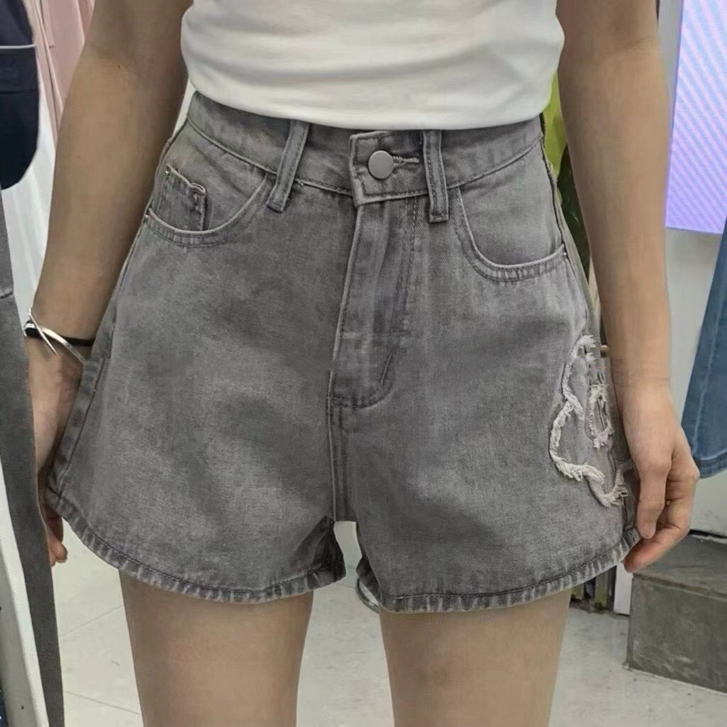 抽鬚花朵圖案牛仔短褲 3556