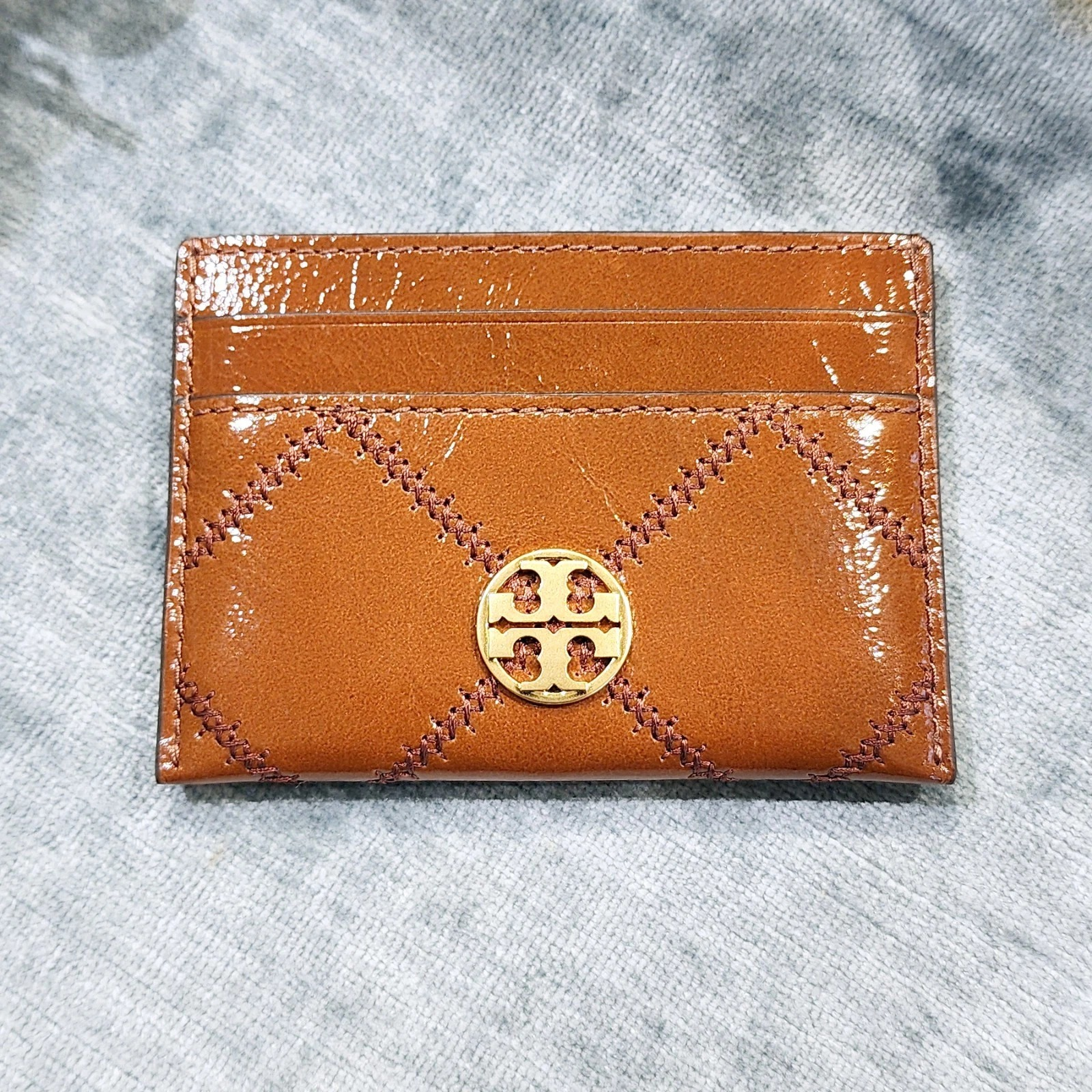 【預購】Tory Burch H041613 交叉縫線卡夾