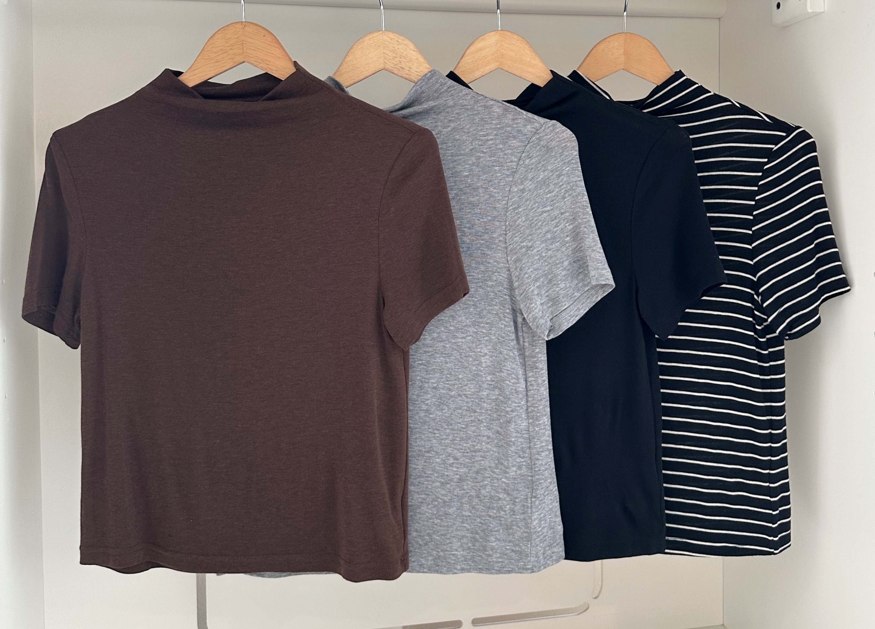 SHORT SLEEVE HIGH NECK BLOUSE